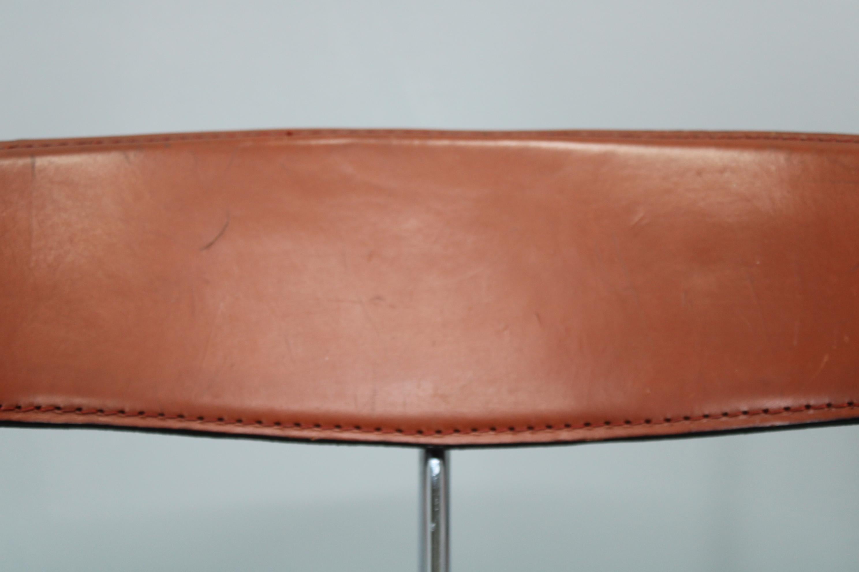 Set di quattro poltrone in pelle 
