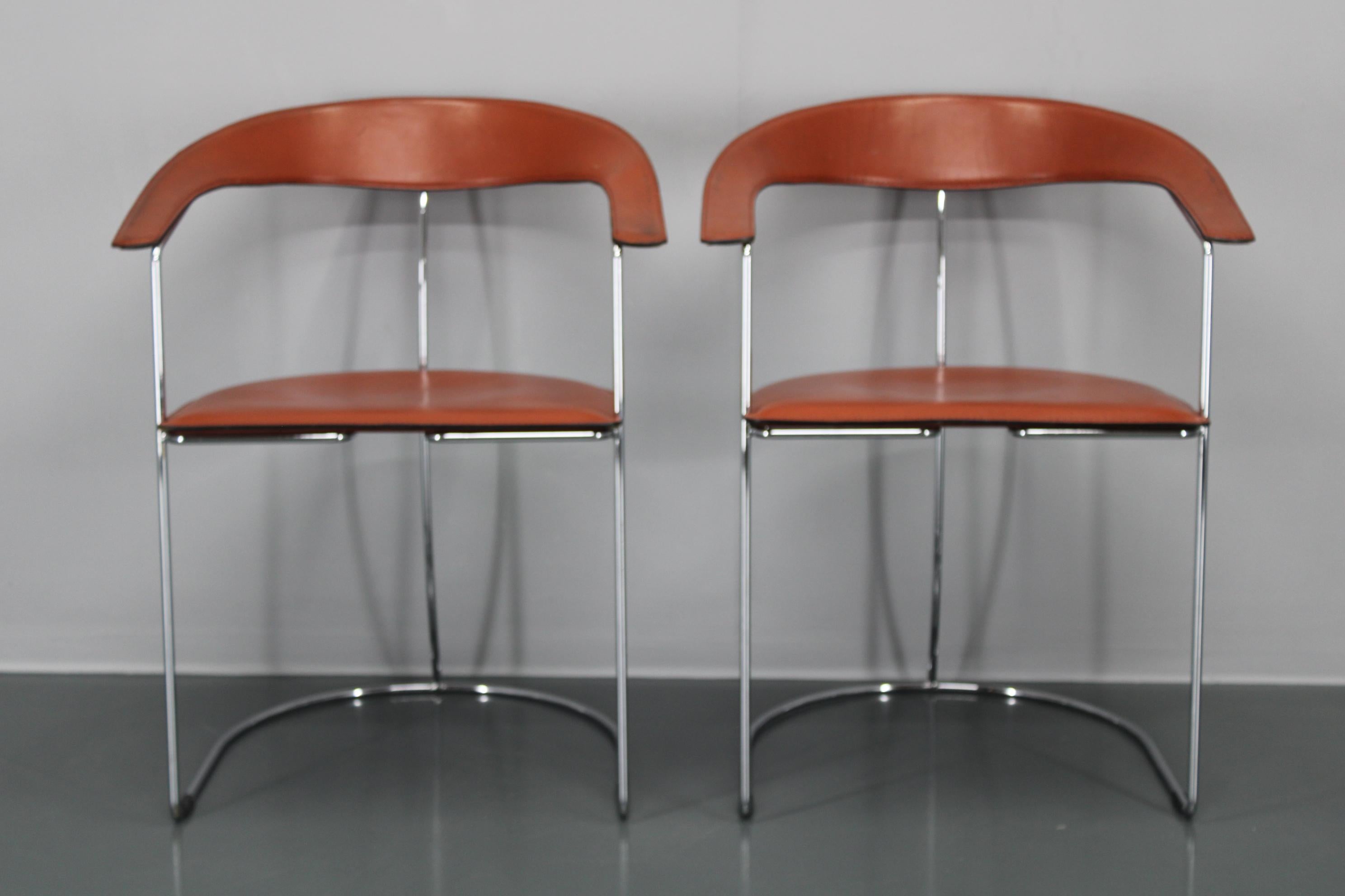 Set di quattro poltrone in pelle 