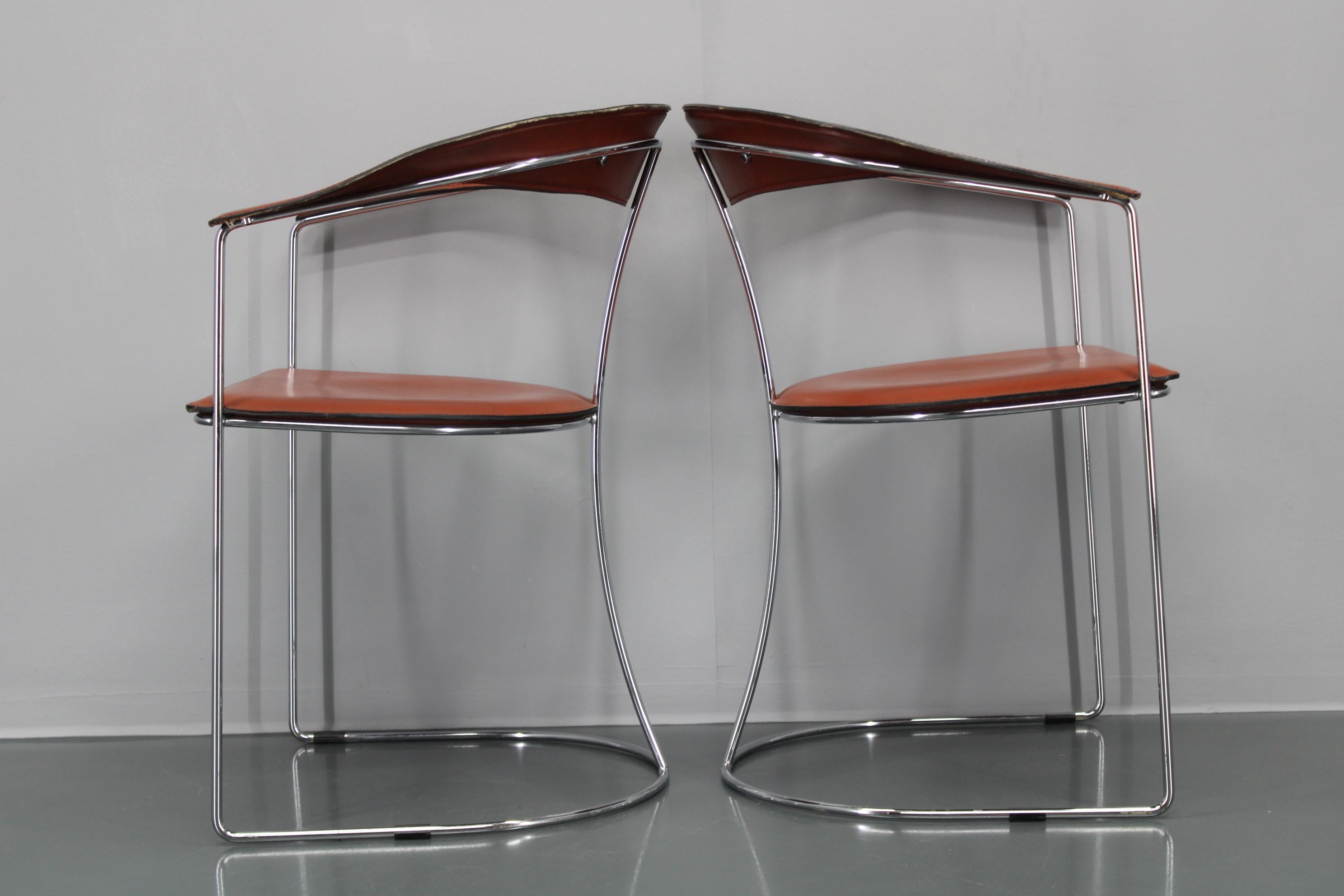 Set di quattro poltrone in pelle 
