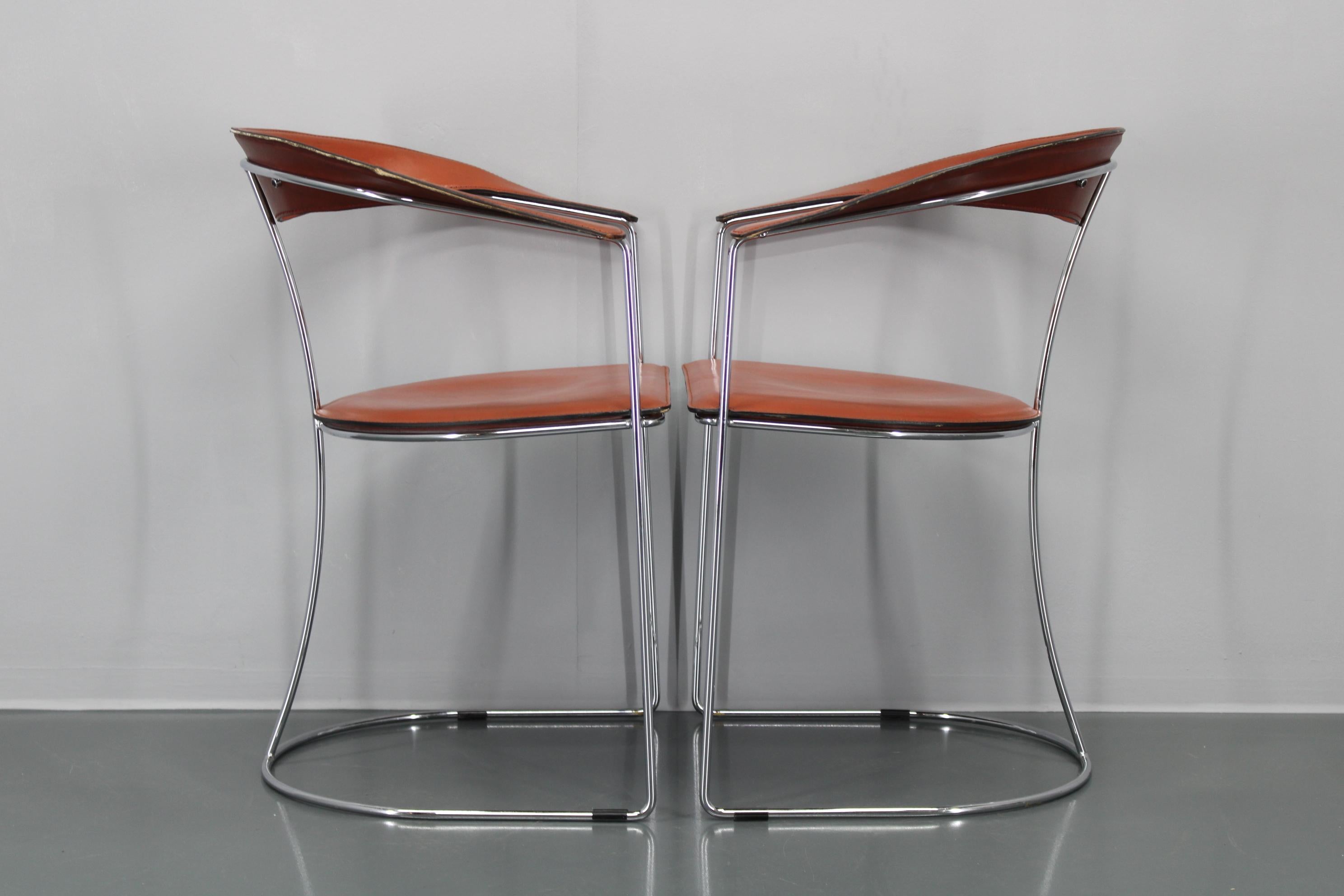 Set di quattro poltrone in pelle 