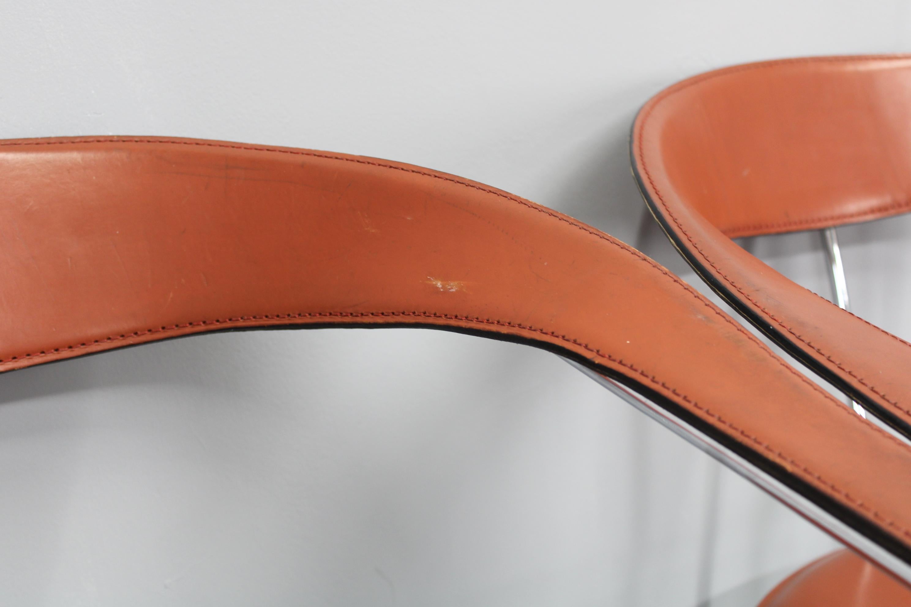 Set di quattro poltrone in pelle 