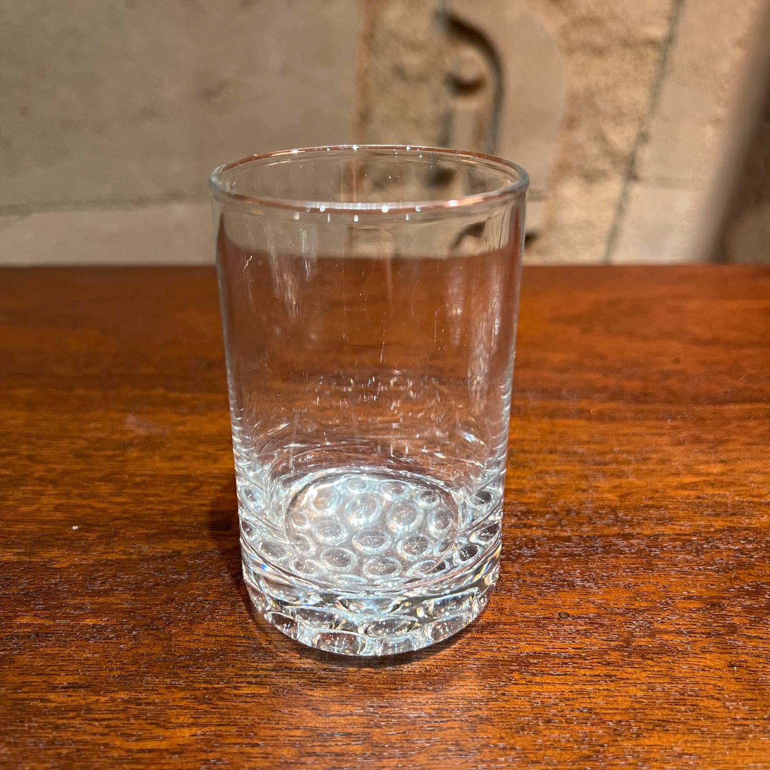 Set of four Scandinavian designed Drinking Glasses juice or whiskey barware
3.5 h x 2.25 diameter
No stamp from the maker. Very clean.
 In the style of Iittala
Preowned original vintage condition
Refer to images.