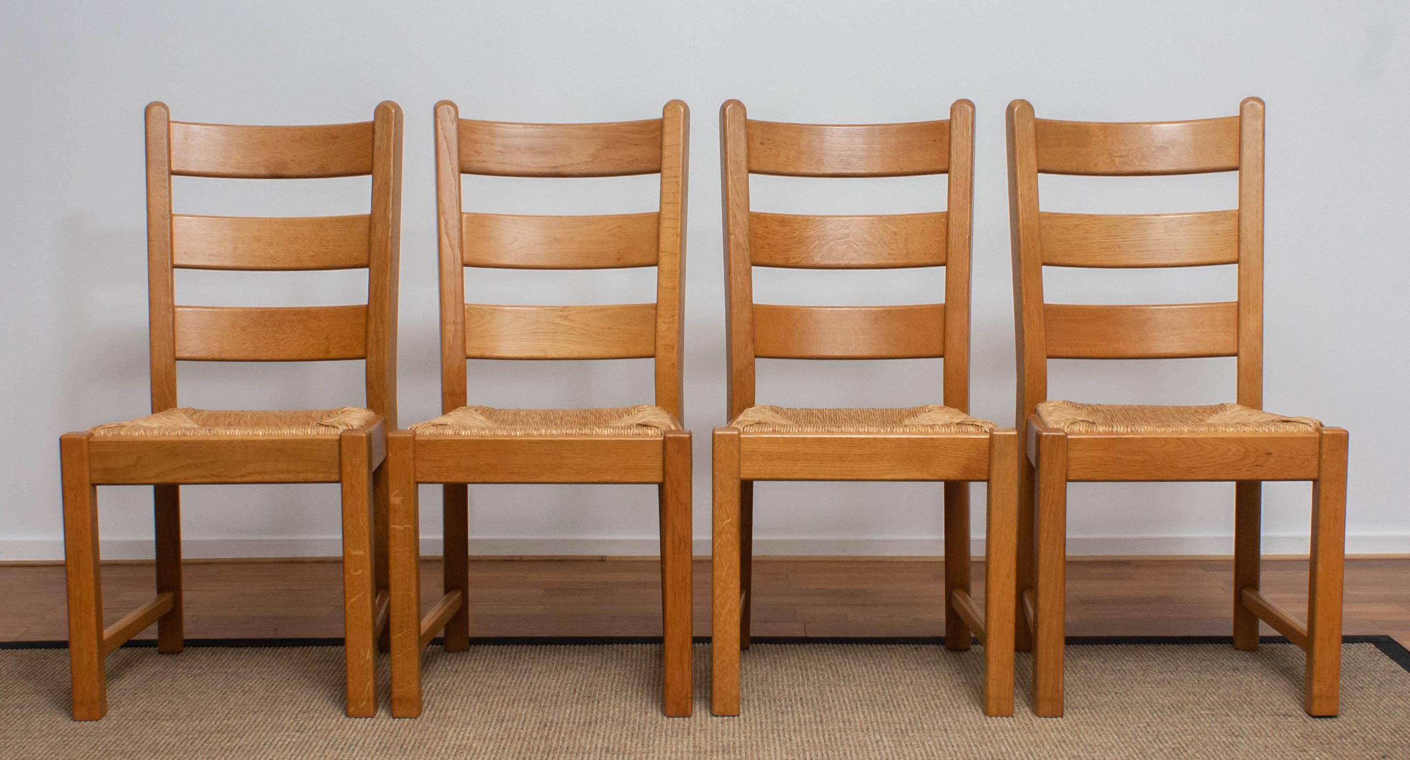 1970s, Set of Four Dutch Oak Ladder Back Dining Chairs with Wicker Seat In Good Condition In Silvolde, Gelderland