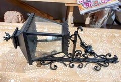 1970s Set of Four Iron and Crystal Wall Lanterns