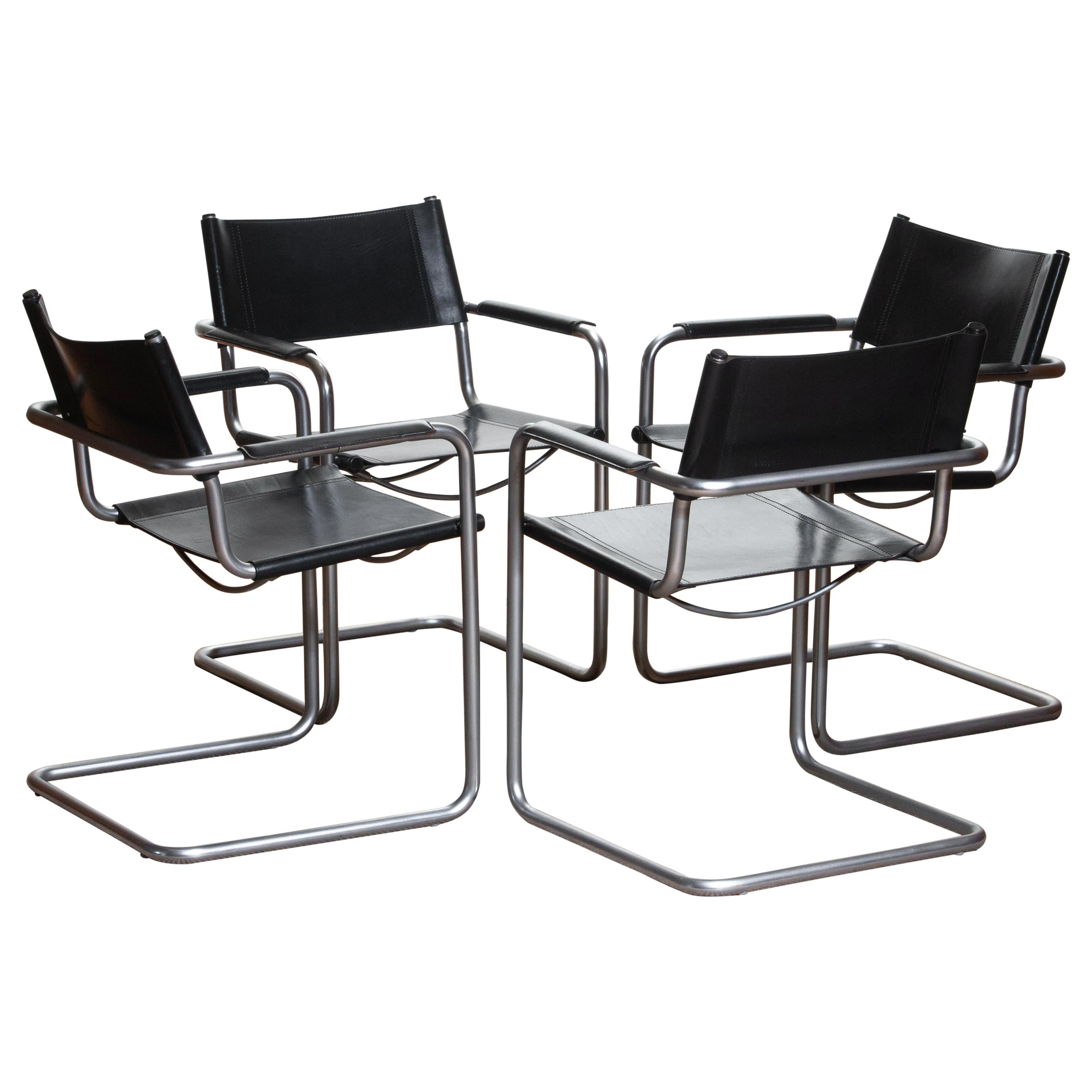 Italian 1970s, Set of Four Mg5 Black Leather Dining or Office Chairs by Matteo Grassi