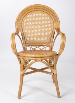 Set de cuatro sillones españoles de bambú y mimbre de los años 70