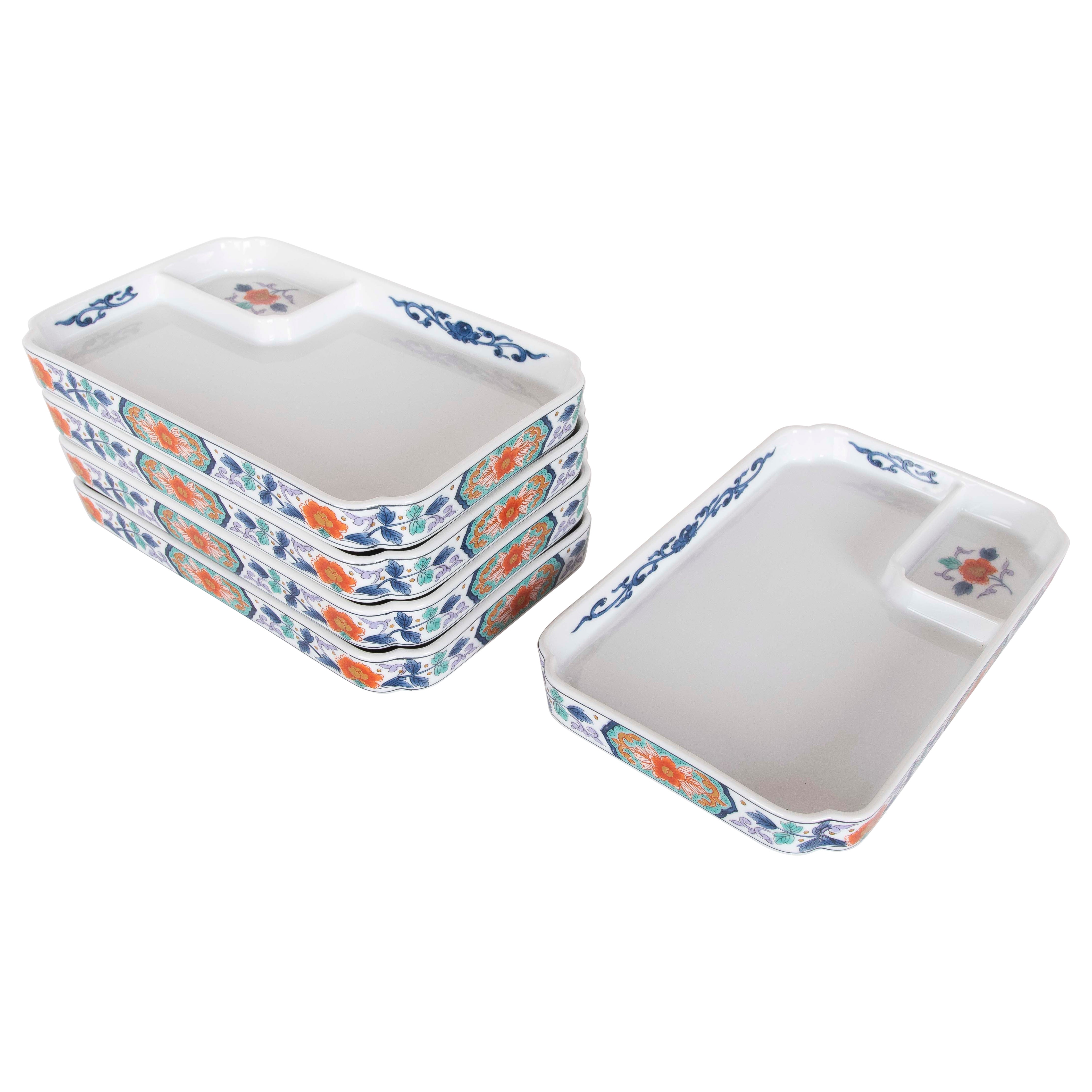 Set de platos rectangulares de porcelana con motivos florales de los años 70