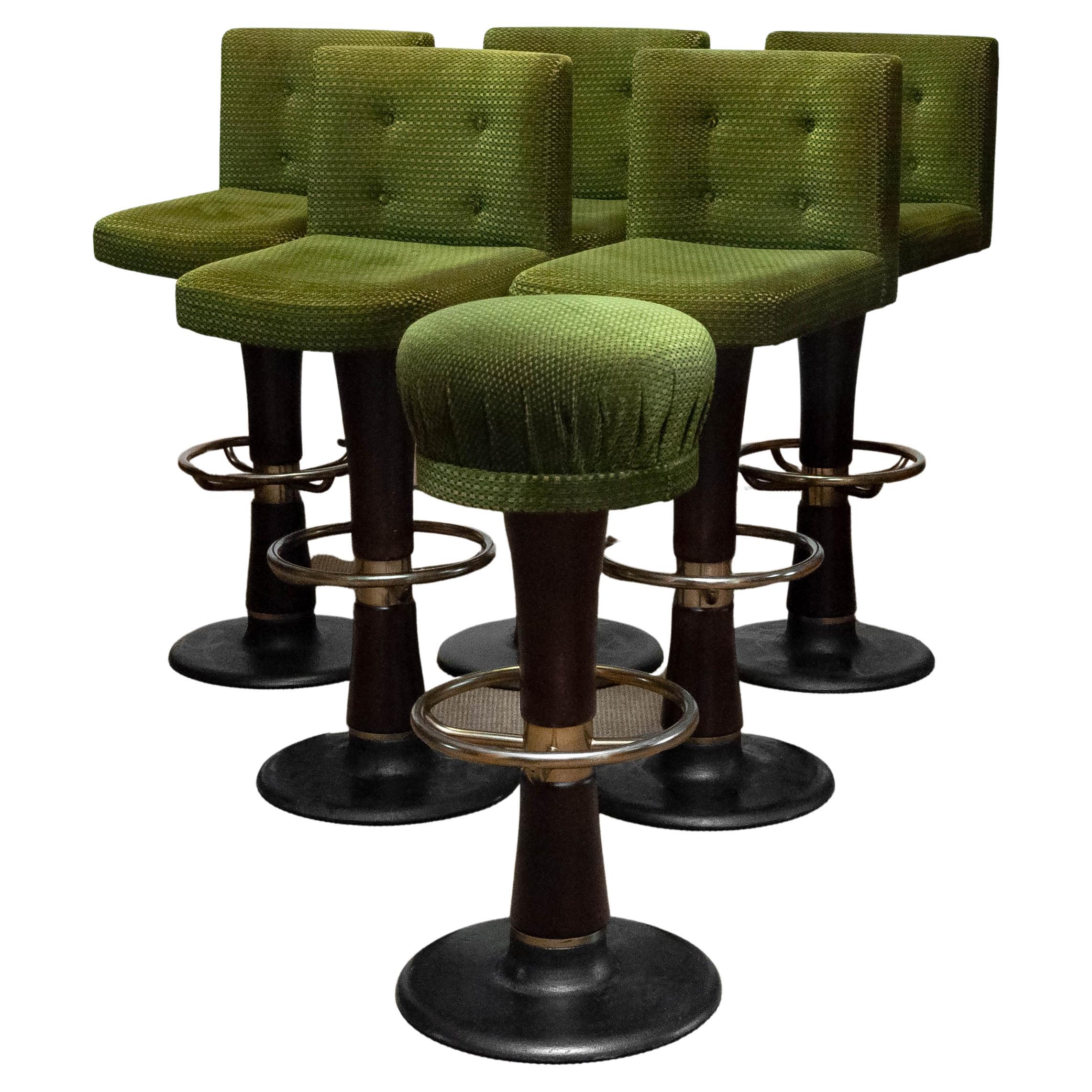 Absolutely stunning and beautiful set of six German ( high quality ) swivel bar / yacht stools consisting five stools with back-rests and one stool ( for the bar tender ) with-out back-rest.
The five swivel stools with back-rest have a spring system