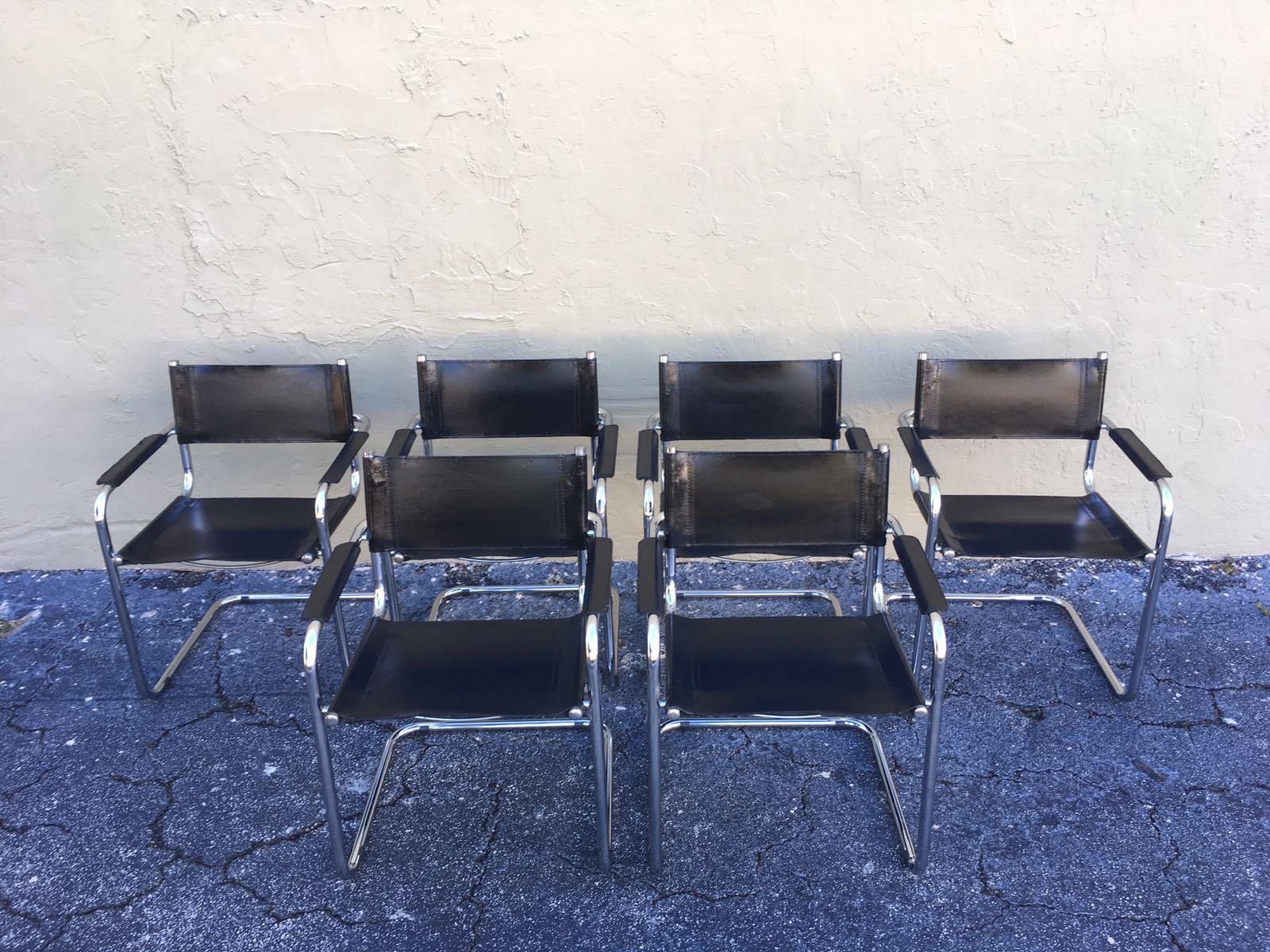 A beautiful set of six dining chairs in style of  Mart Stam Bauhaus leather MG5 by Matteo Grassi, Italy.
The chairs have tubular titanium look steel frames with sturdy black leather seating and back and armrest.
The chairs are in a very nice