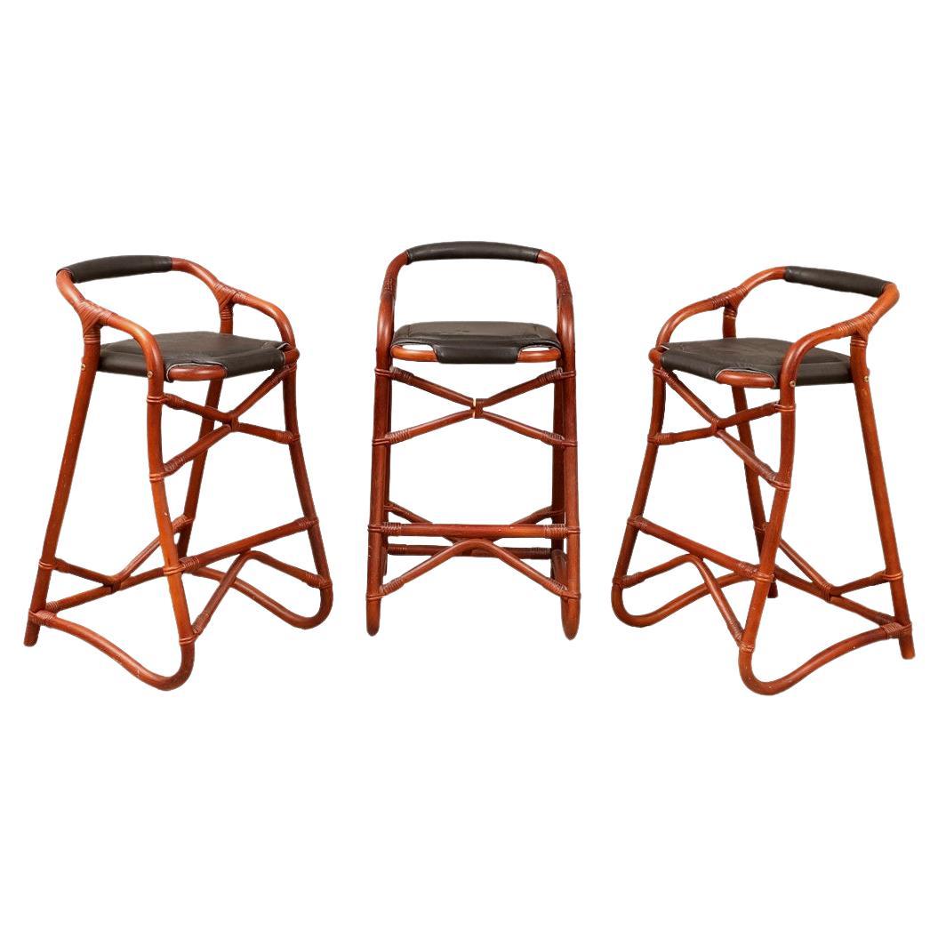 1970s Set of Three French Riviera Bamboo Bar Stools with Leather Seats For Sale