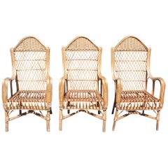 Conjunto de tres sillones españoles de bambú y ratán lacado de los años 70
