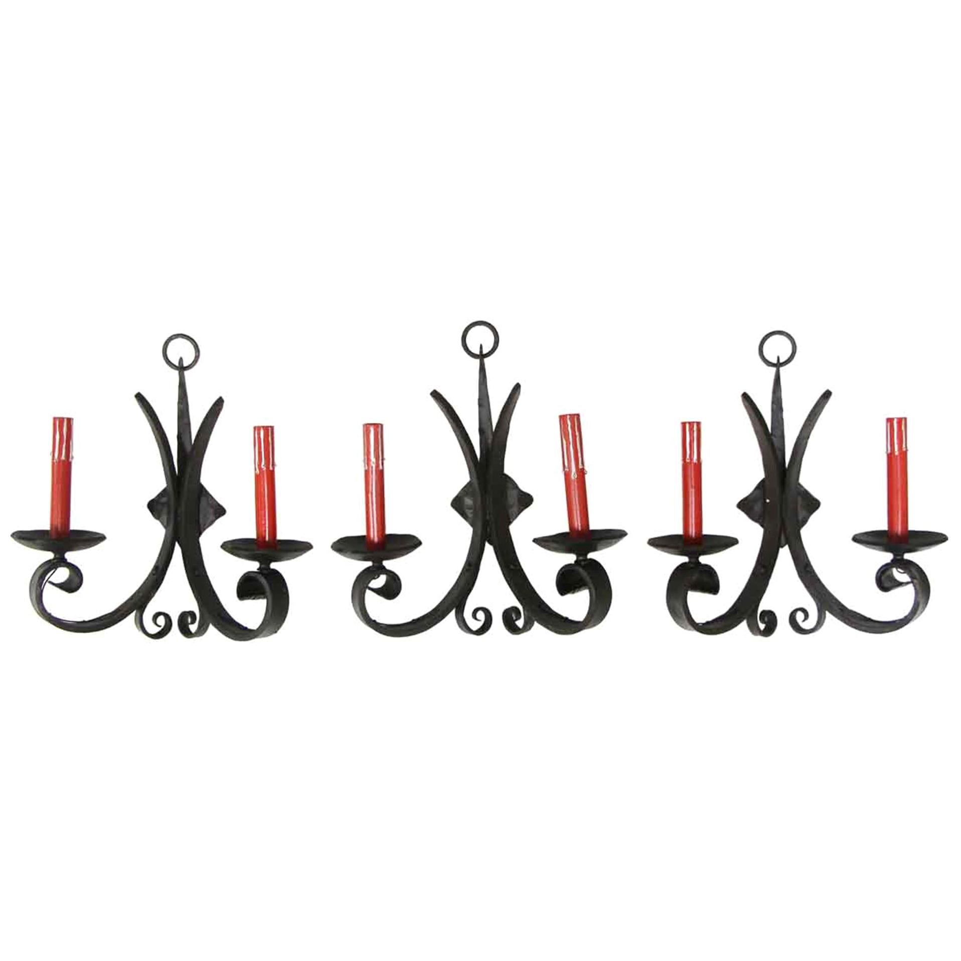 1970s Set of Three Wrought Iron Gothic Sconces with Red Candlesticks