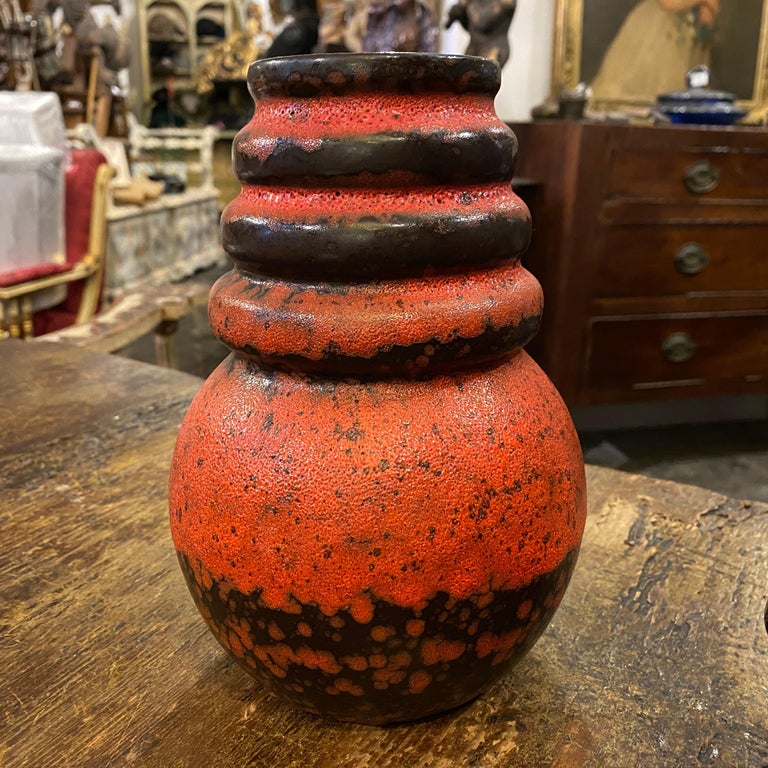 Two red and black fat lava ceramic vases made in Germany in the Seventies. They are in perfect conditions. Heights of vases are 22 cm and 18 cm.