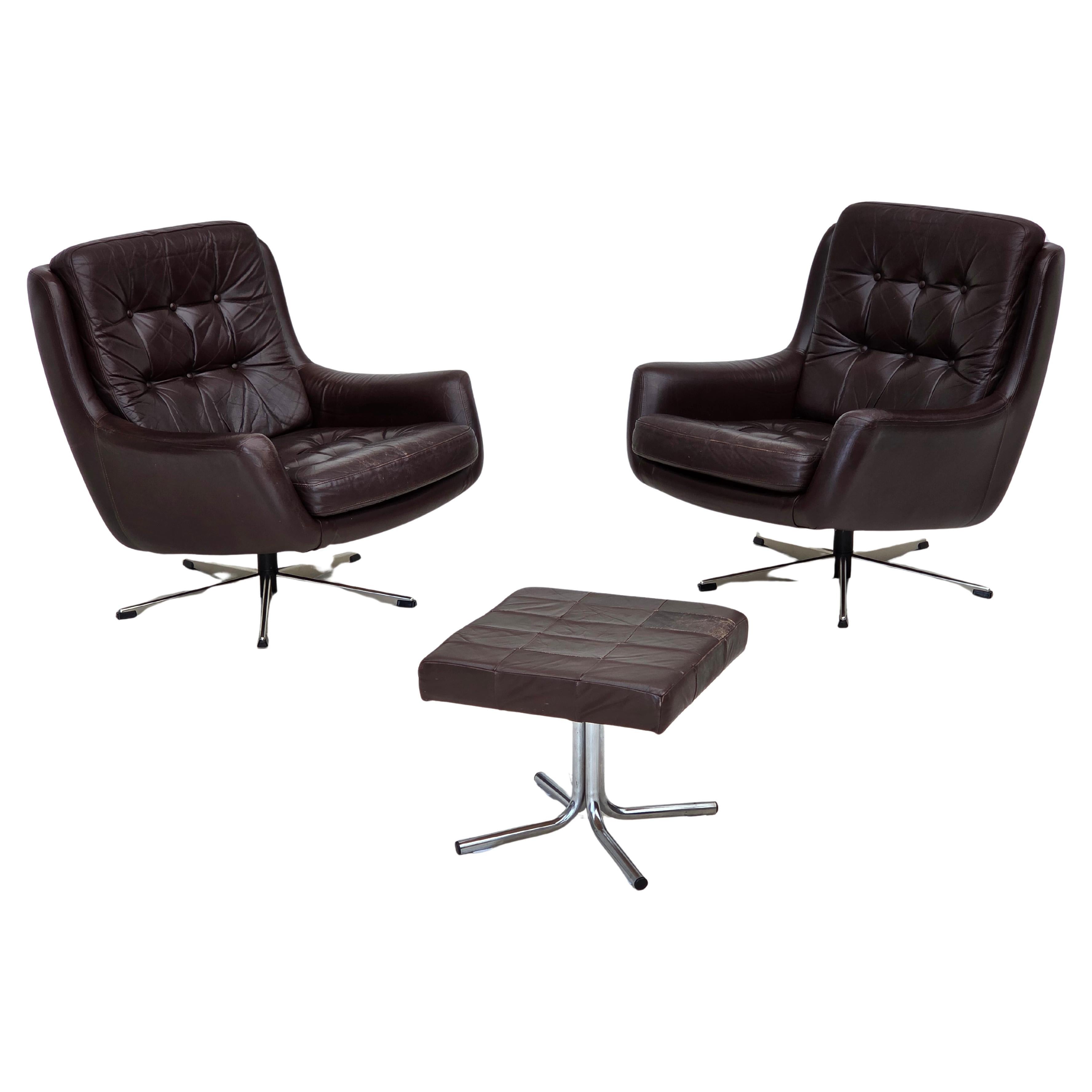 1970s, set of two swivel lounge chairs with footstool, leather.