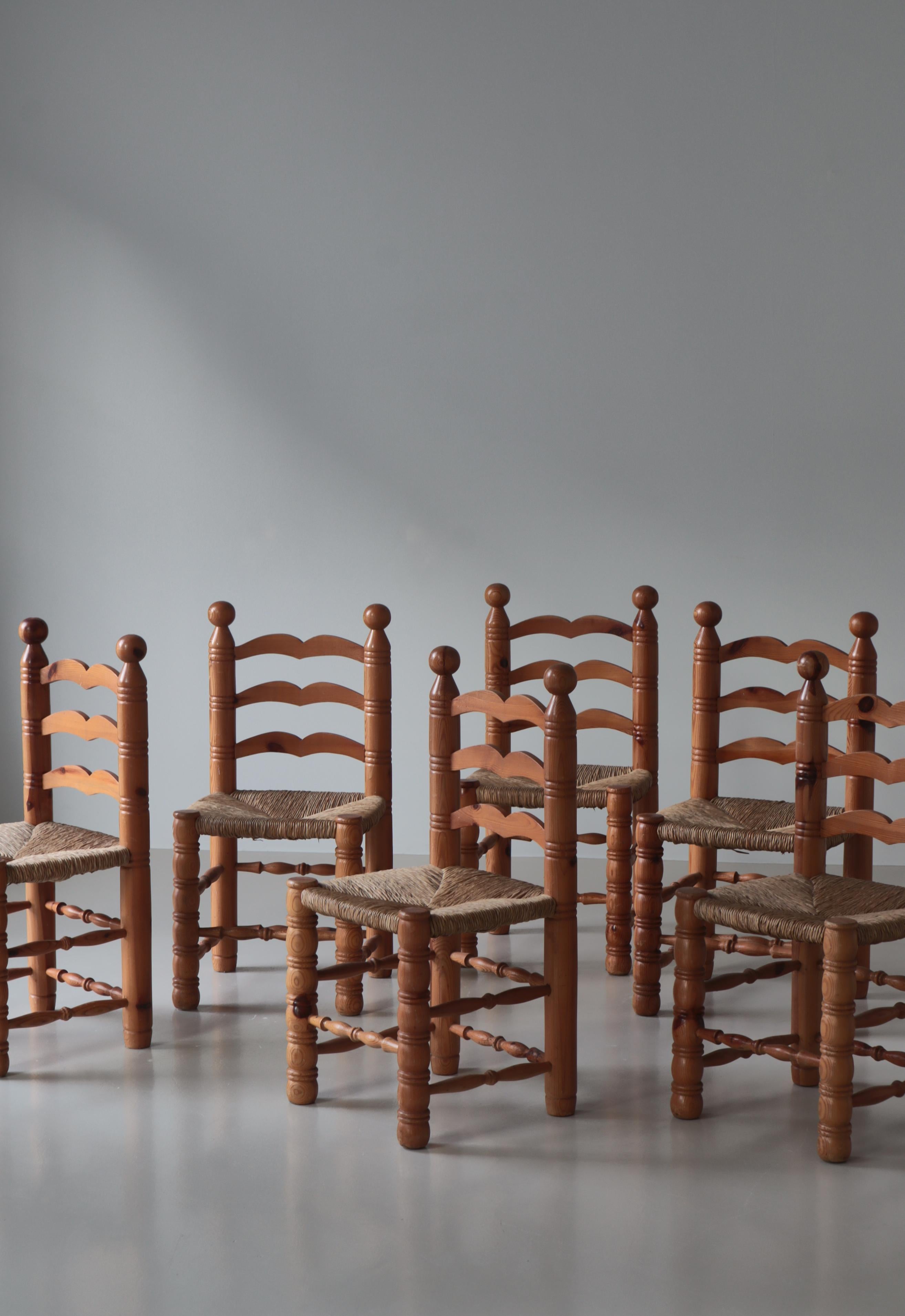 Charming set of shaker style dining chairs made in Sweden in the 1970s. The chairs are executed in solid pinewood and the seats are woven seagrass. In the style of Charles Dodouyt.