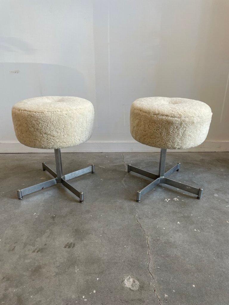 1970's shearling stool on steel base. Newly reupholstered shearling stools on steel X base. Sold individually (set of four).