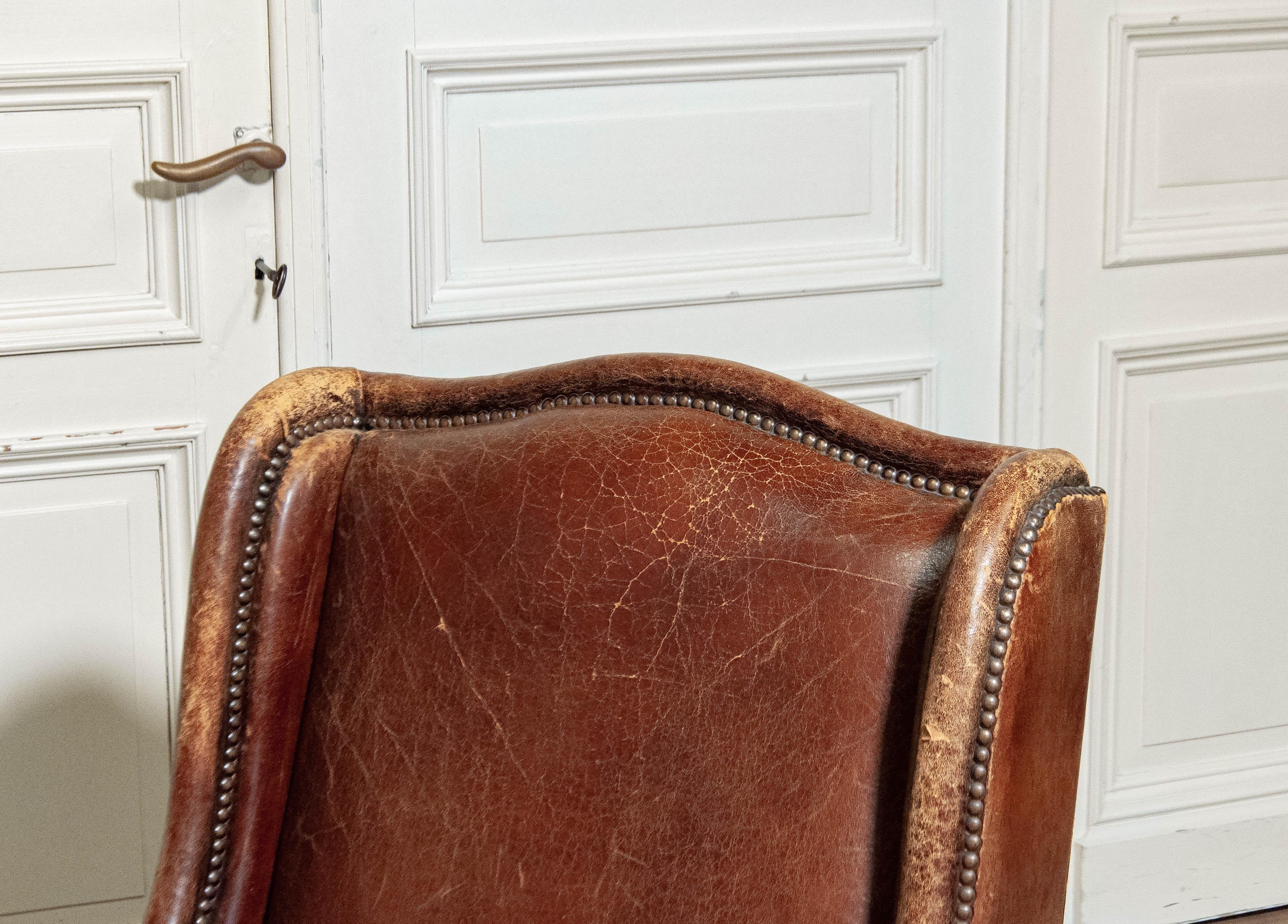 1970s Sheepskin Leather Wingback Lounge Chair , Denmark In Fair Condition For Sale In Silvolde, Gelderland
