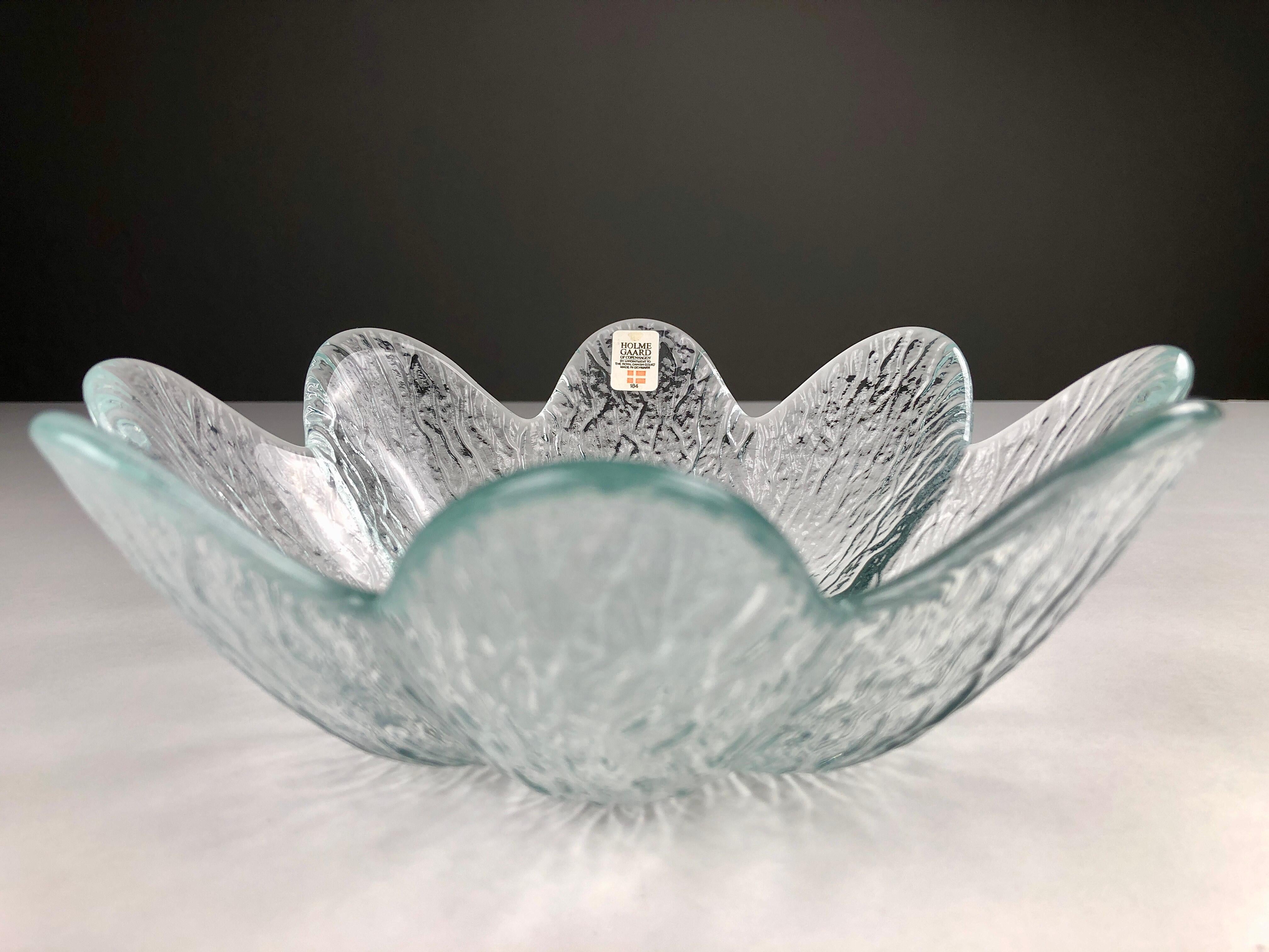 1970s Sidse Werner Danish Glass Bowl by Holmegaard

The glass bowl is in very good condition and will be shipped without the candies on the last photo.