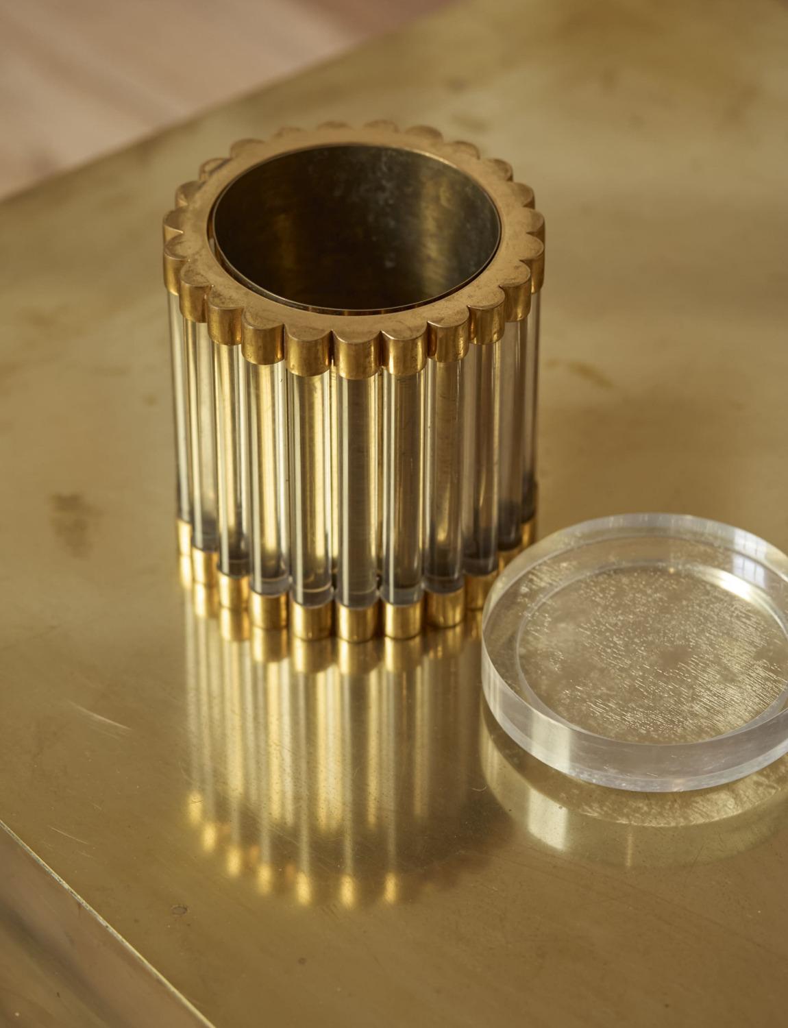 One of my most exciting finds of the year, this wonderful brass and plexiglass pot was designed by the amazing Gabriella Crespi in the 1970s. It is signed on the base and can be used in a home bar as an ice bucket or as a desk pot. It is perfection.