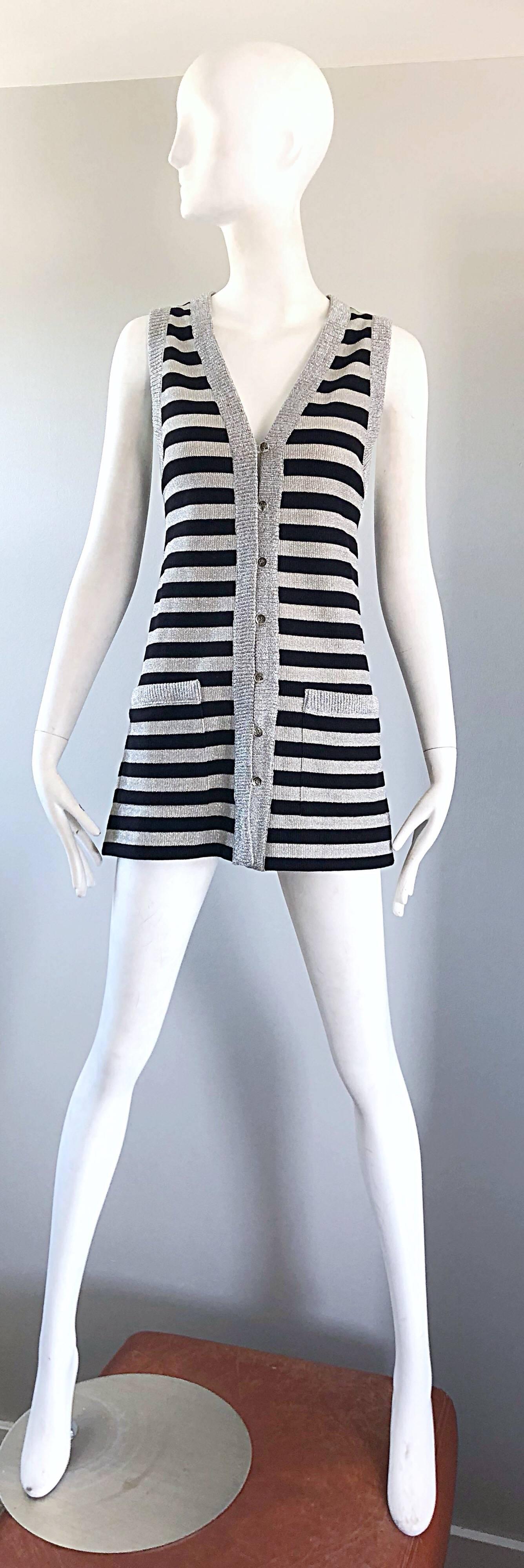 Chic 70s silver and black metallic striped sleeveless tunic vest OR mini dress! Silver buttons down the front make this piece perfect for layering (or on its own). Pockets at each side of the waist. Great belted or alone. In perfect