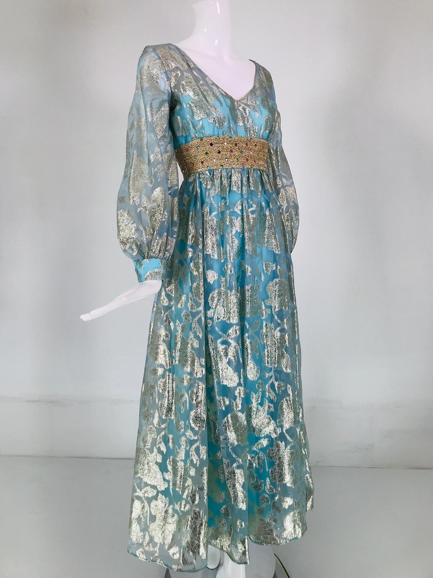 1970s silver metallic blue organza jewel waist maxi dress. Beautiful shade of Tiffany blue with silver metallic design maxi dress, scoop neck, long sleeve dress has band cuffs that close with snaps. Fitted high waist bodice has a wide woven band