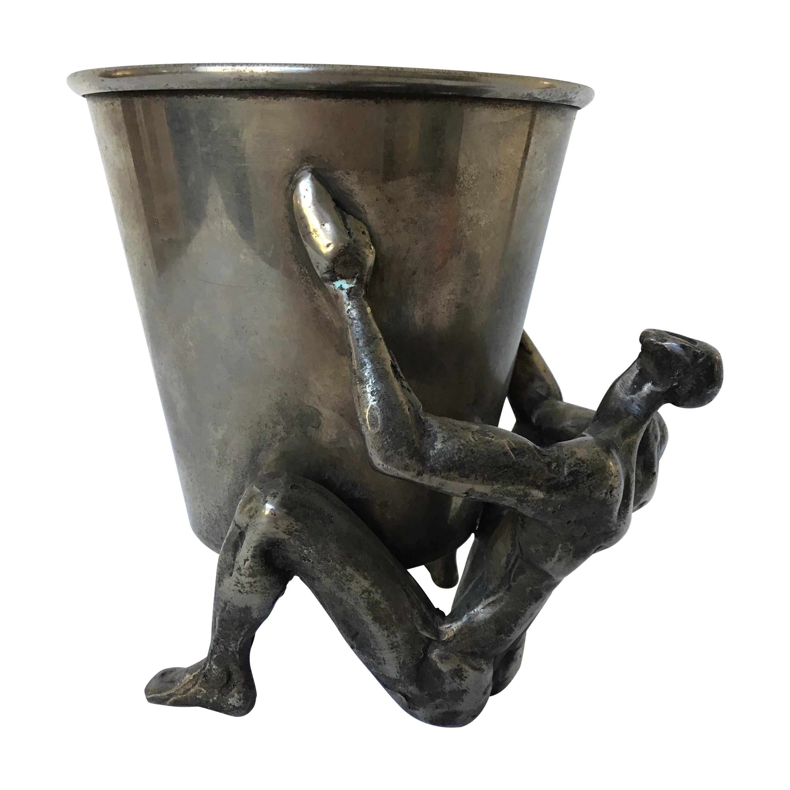 1970s Silver Plate Man Holding Vessel