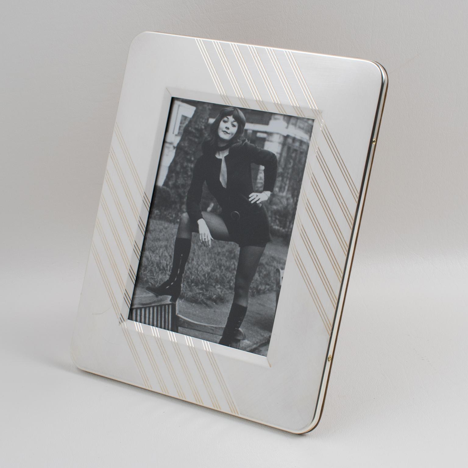 Lovely Italian silver plate picture photo frame. A timeless polished silverplate metal with striped pattern. Rich high gloss wood back and easel. Marked on the side 