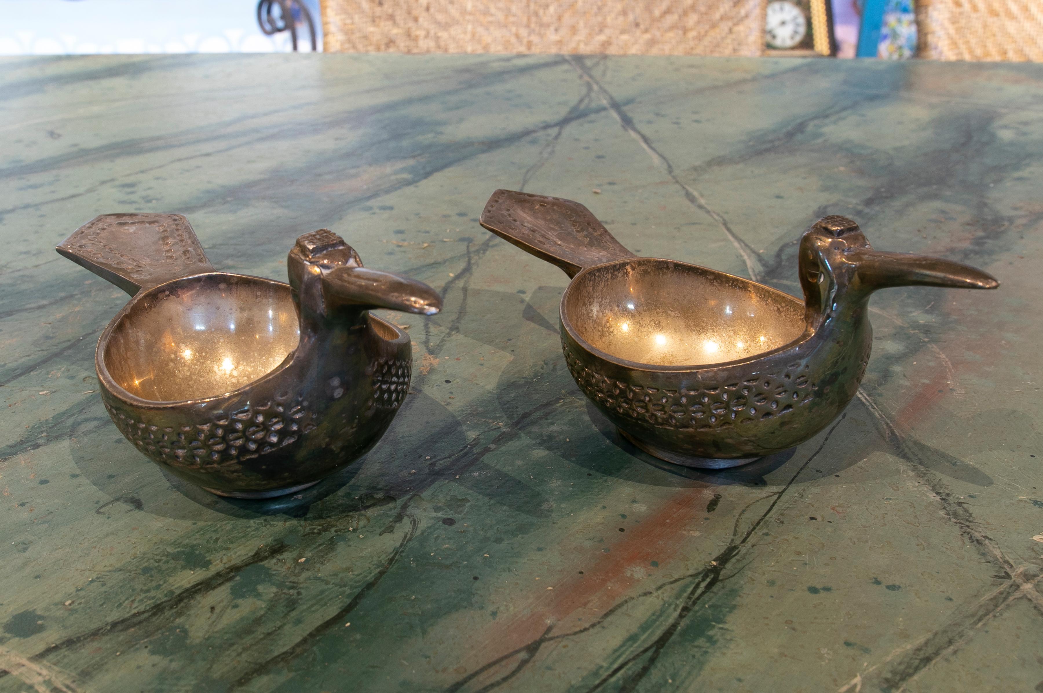 1970s Silver-plated metal bowls in the shape of birds.
