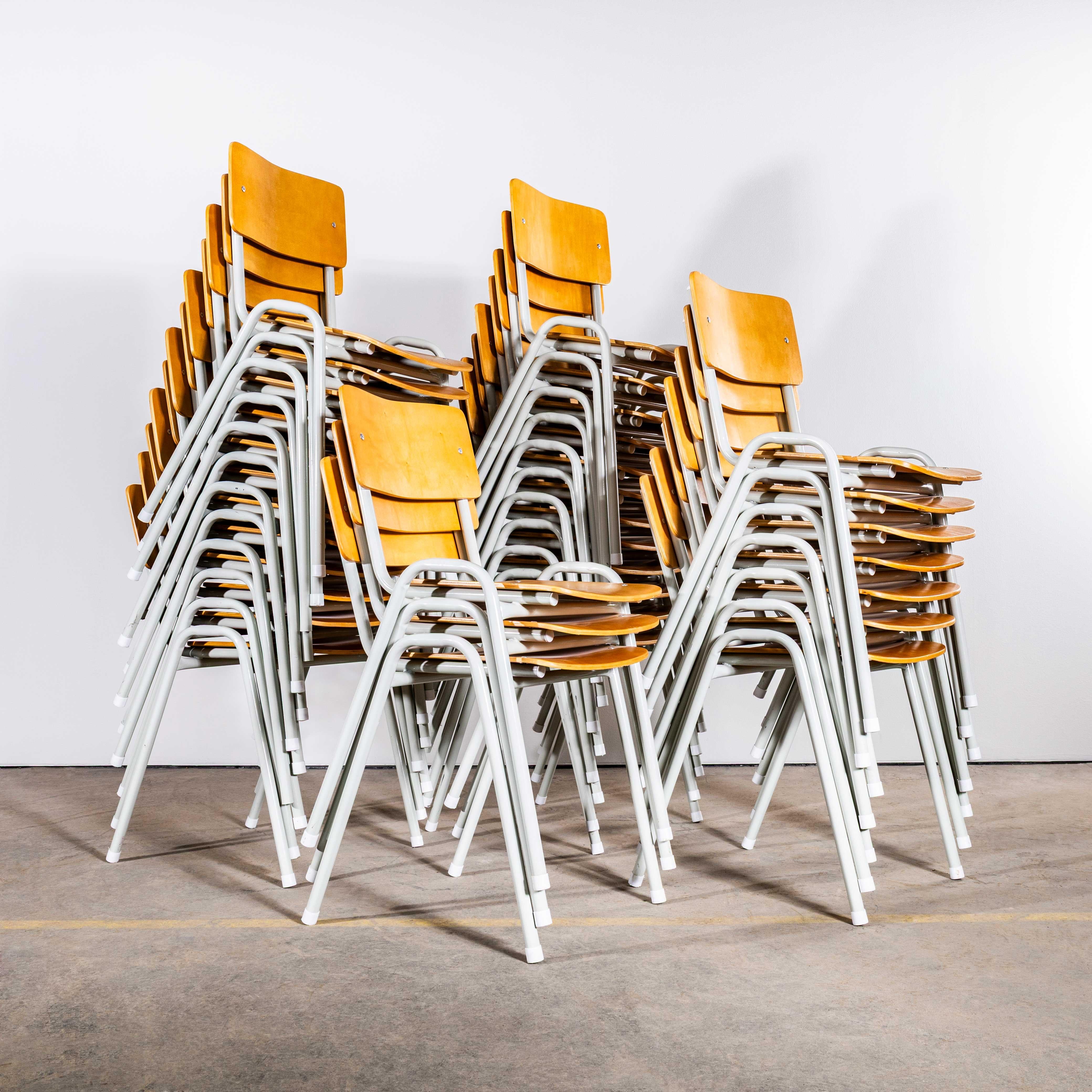 1970’s Simple Stacking University Dining Chairs – Large Quantity Available. 

We sourced these great chairs from a campus in France. Great robust stacking chairs with a heavy sturdy metal frame and comfortable beech ply laminated seats. The chairs