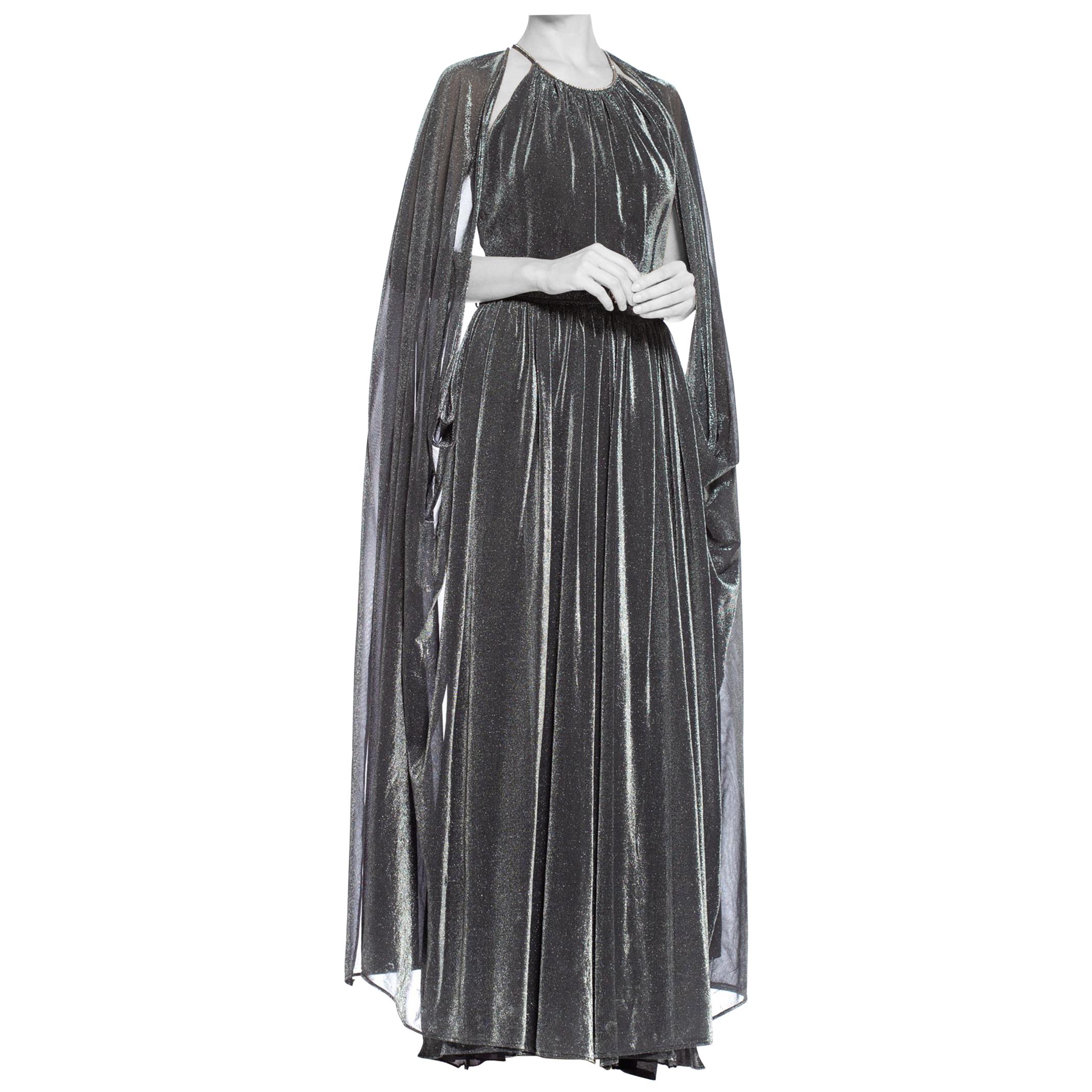 1970S Silver Metallic Lurex Knit Slinky Disco Gown With Attached Cape & Crystal