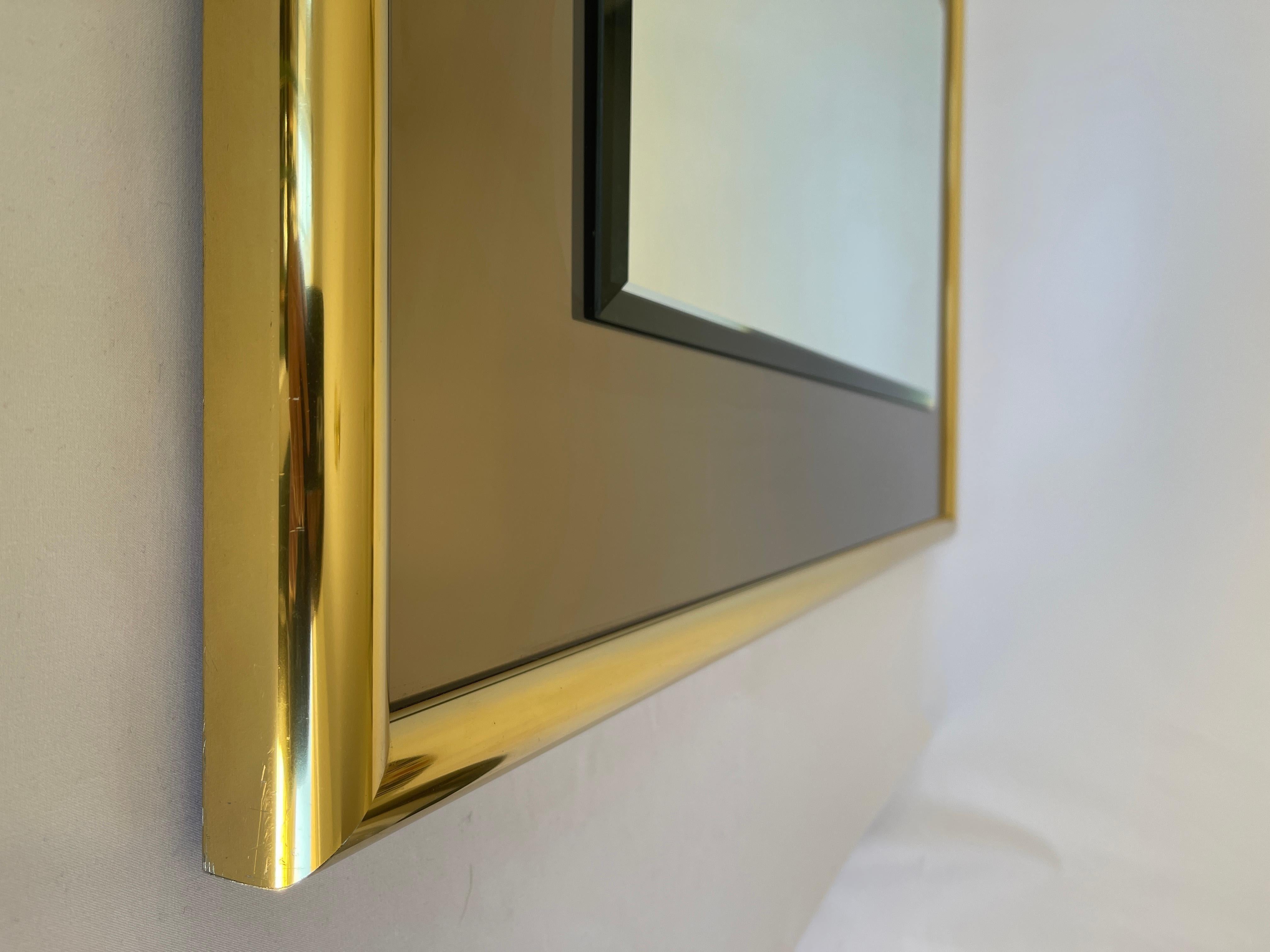 American 1970s Smoke Glass Rectangular Mirror with Brass Frame For Sale