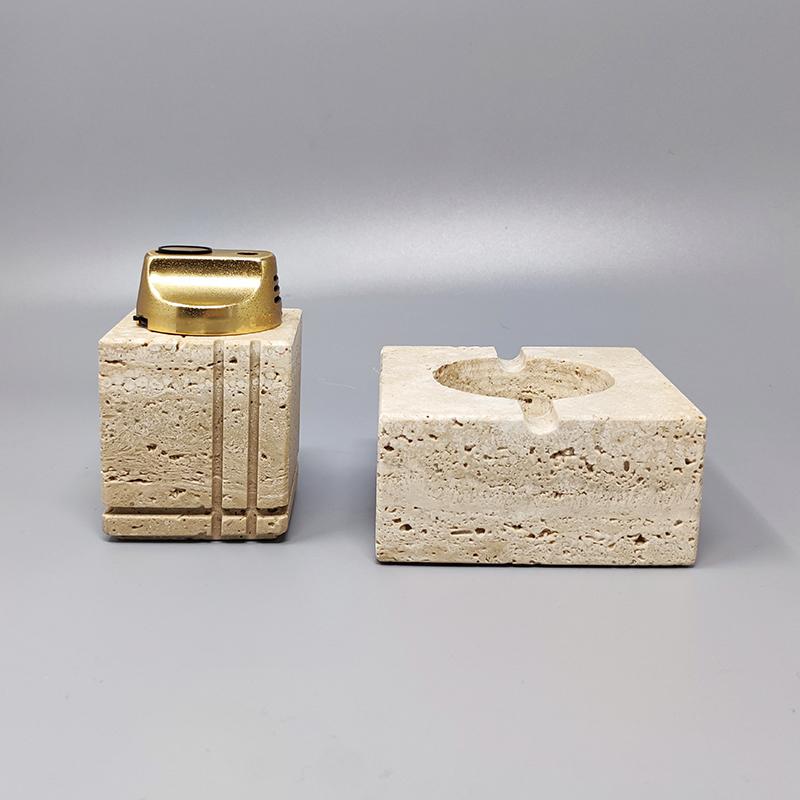 1970s gorgeous smoking set by F.lli Mannelli in travertine with ashtray and table lighter, everything is handmade carved. Made in Italy. The table lighter works. 
This smoking set is in excellent condition.
Dimension :
Table lighter
2,36
