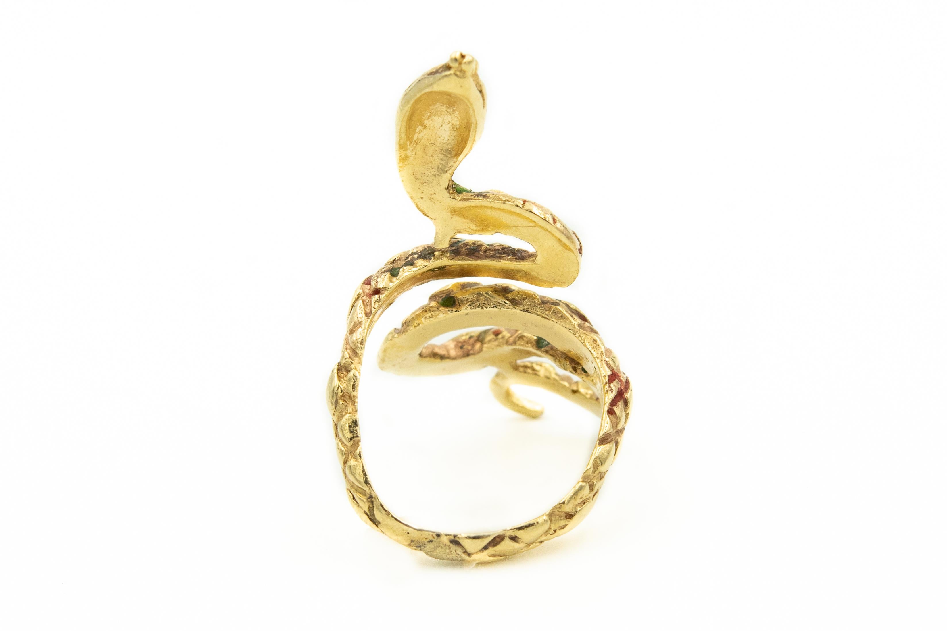 gold snake ring with emerald eyes