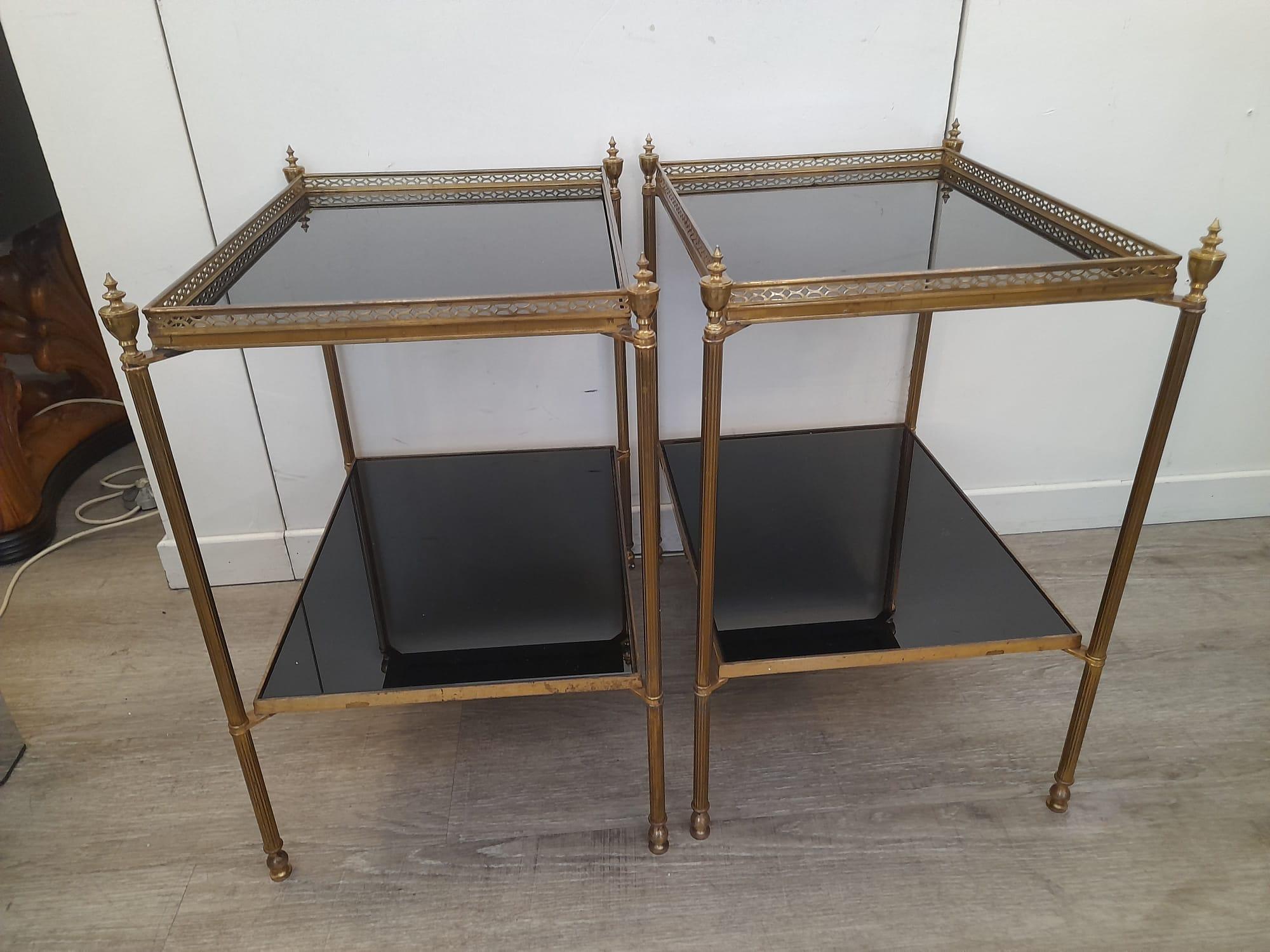 1970s Solid brass black glasses shelves attributed to Maison Jansen two tables.

A pair of identical tables featuring two black glass shelves and solid brass structure.

Each table measures: W 45 cm, D 30 cm, H 53 cm.

They can be perfect in