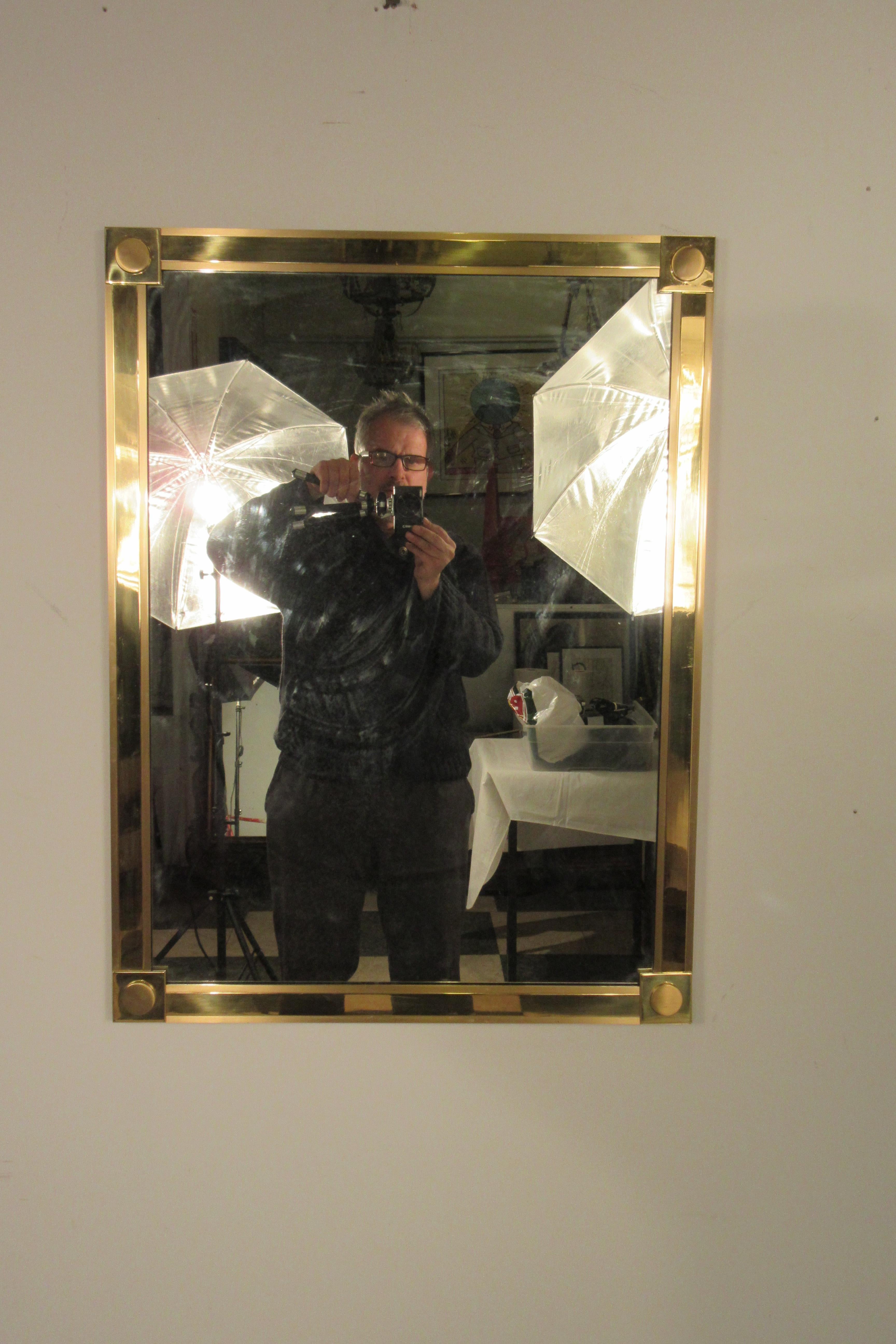 1970s solid brass mirror. Very chic and simple.