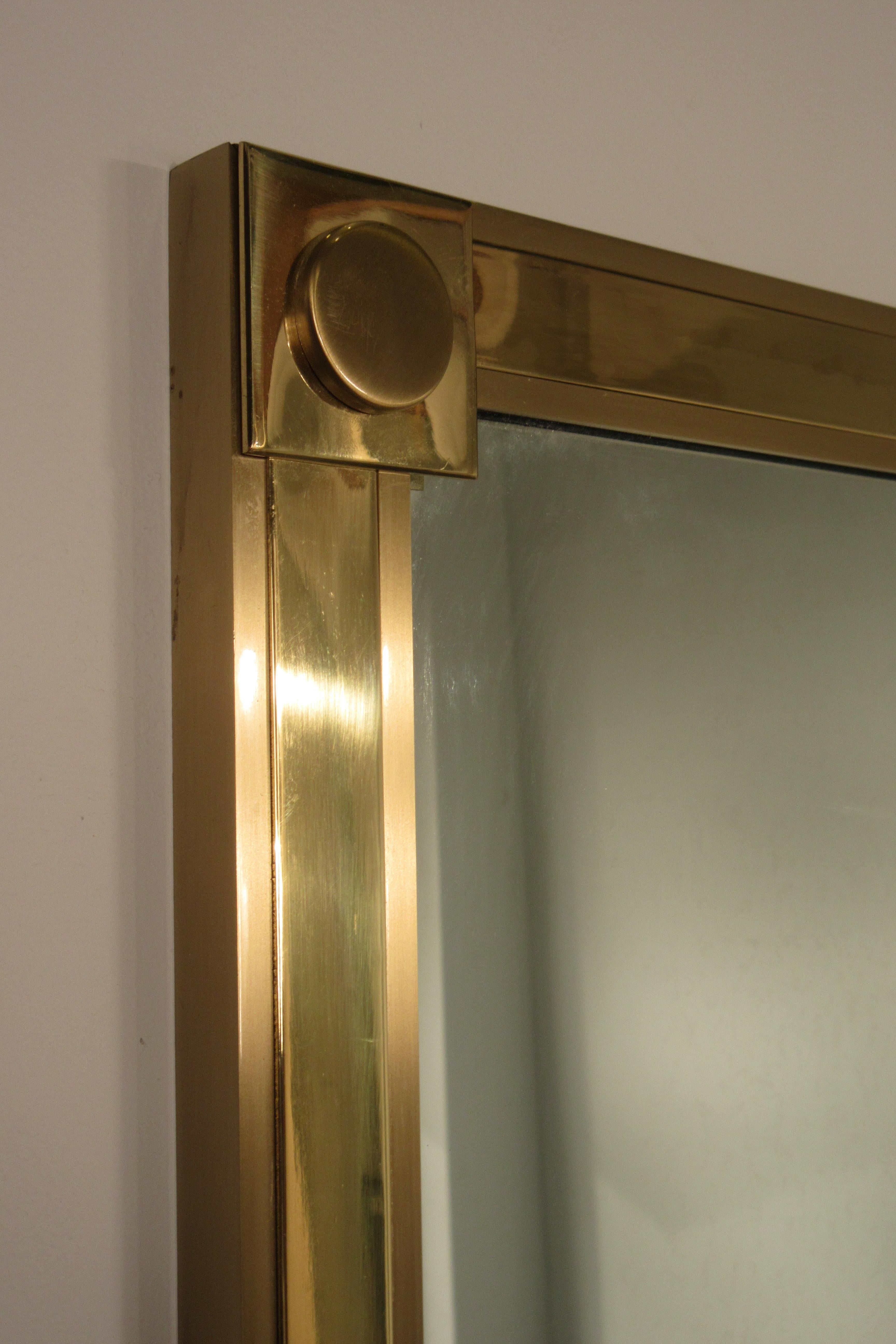 unlacquered brass mirror