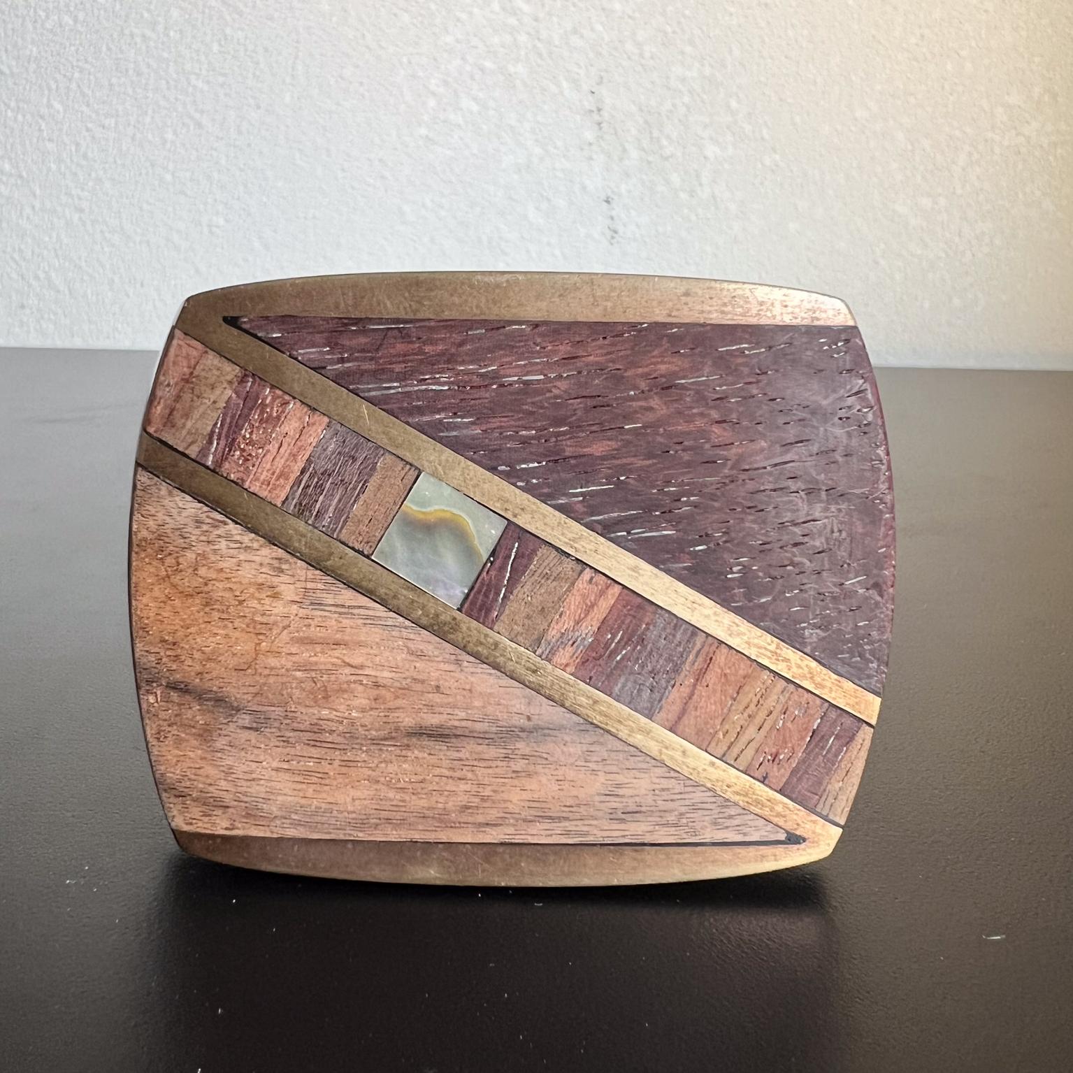 1970s Solid Bronze Abalone Belt Buckle
stamped by maker
3.25 w x 2.25 h x .38 d
Preowned vintage
Refer to images