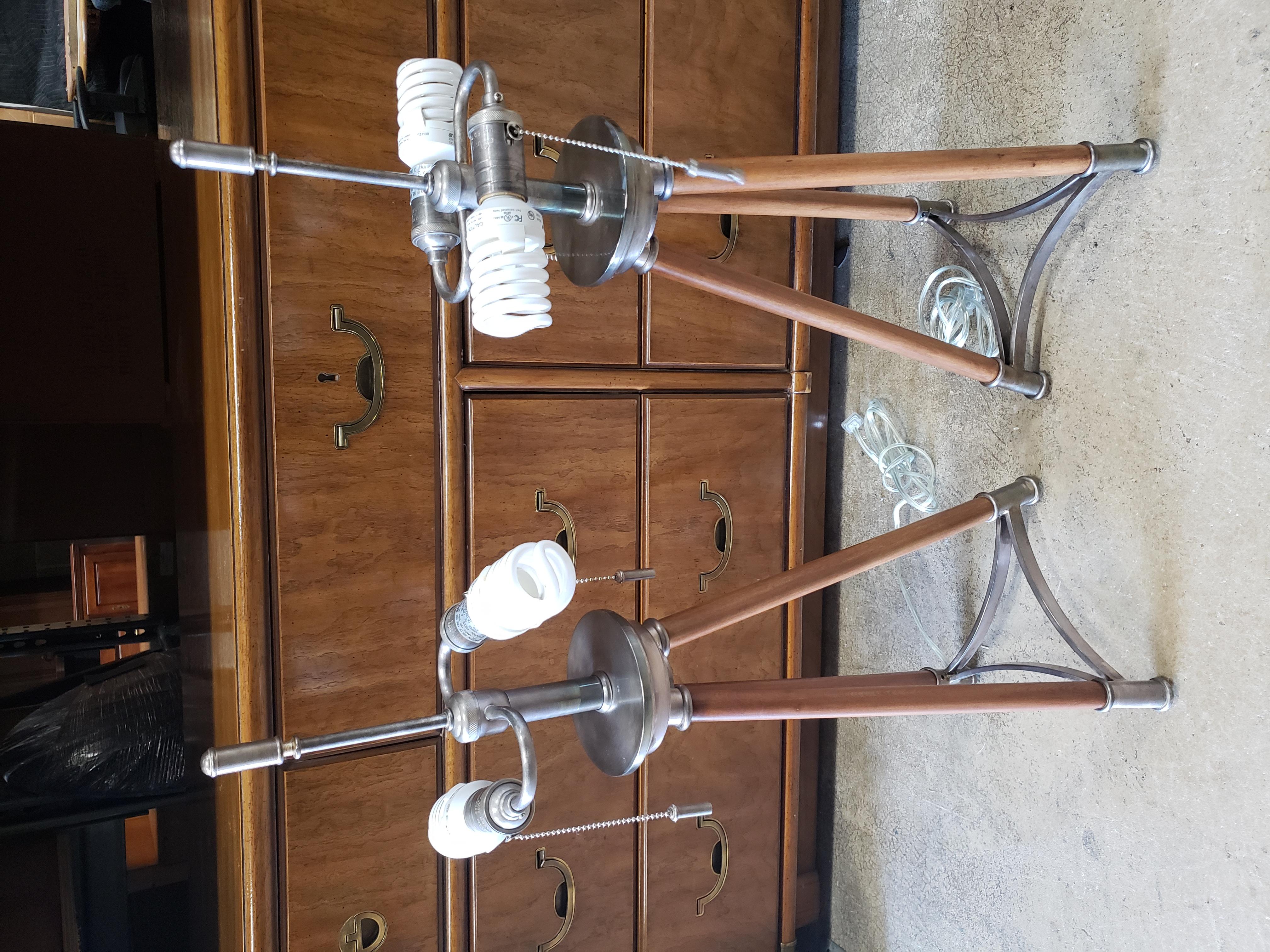 For your consideration is this magnificent pair of 1970s vintage solid maple and Nickel Tripod table lamps.
Solid maple tripod on triangular Brushed nickel base.
Measures 32
