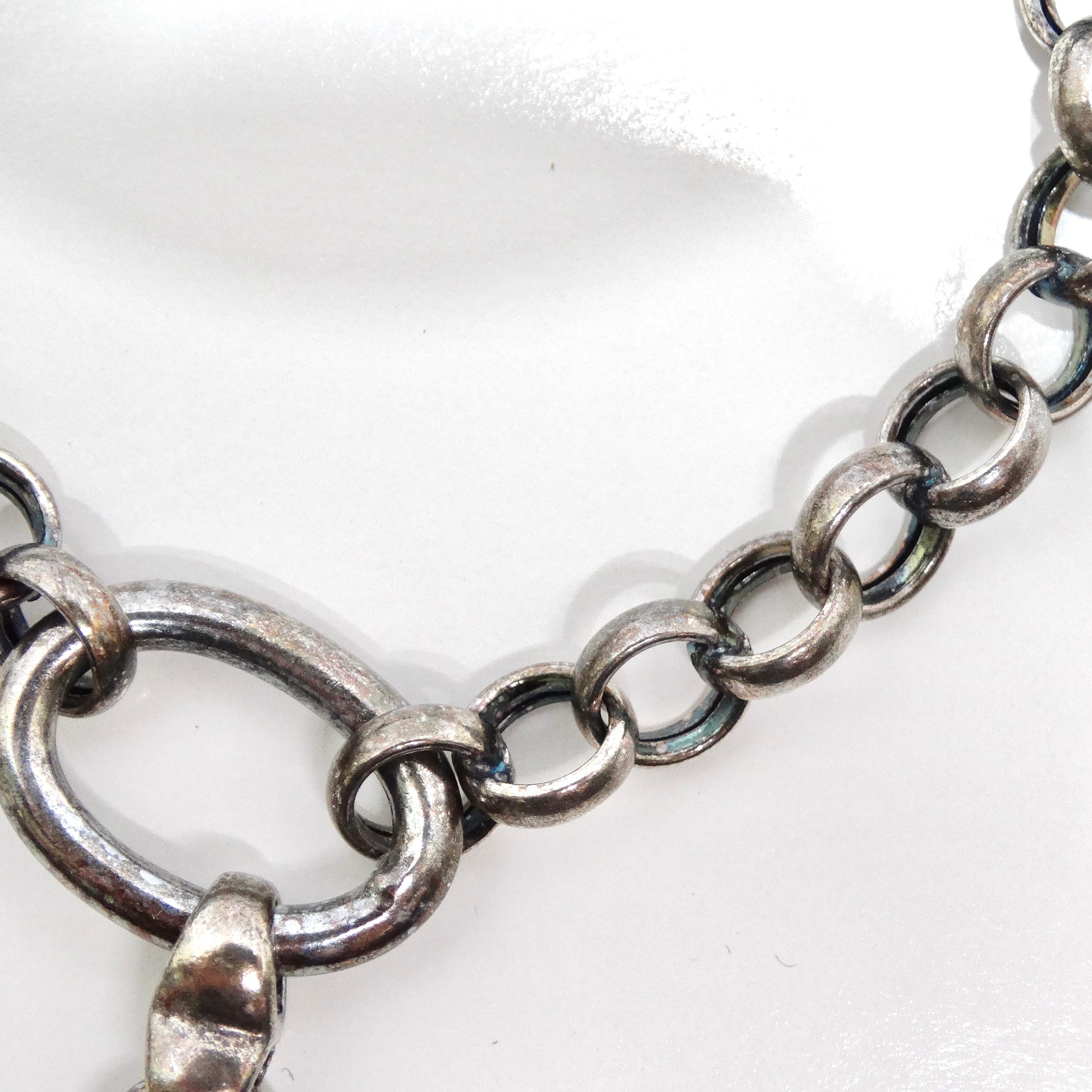 1970s Solid Silver Heart Charm Bracelet In Good Condition For Sale In Scottsdale, AZ