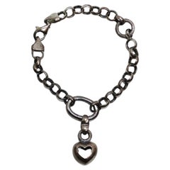 Used 1970s Solid Silver Heart Charm Bracelet