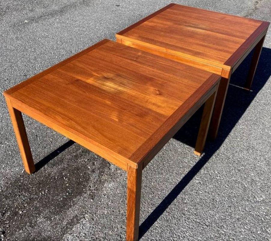 A gorgeous pair of teak Danish Modern end tables by Vejle Stole Mobelfabrik. These lovely tables measure 27-1/2” square, stand 20” tall, and are in excellent condition. There are a few minor discolorations in the finish, but just check out the