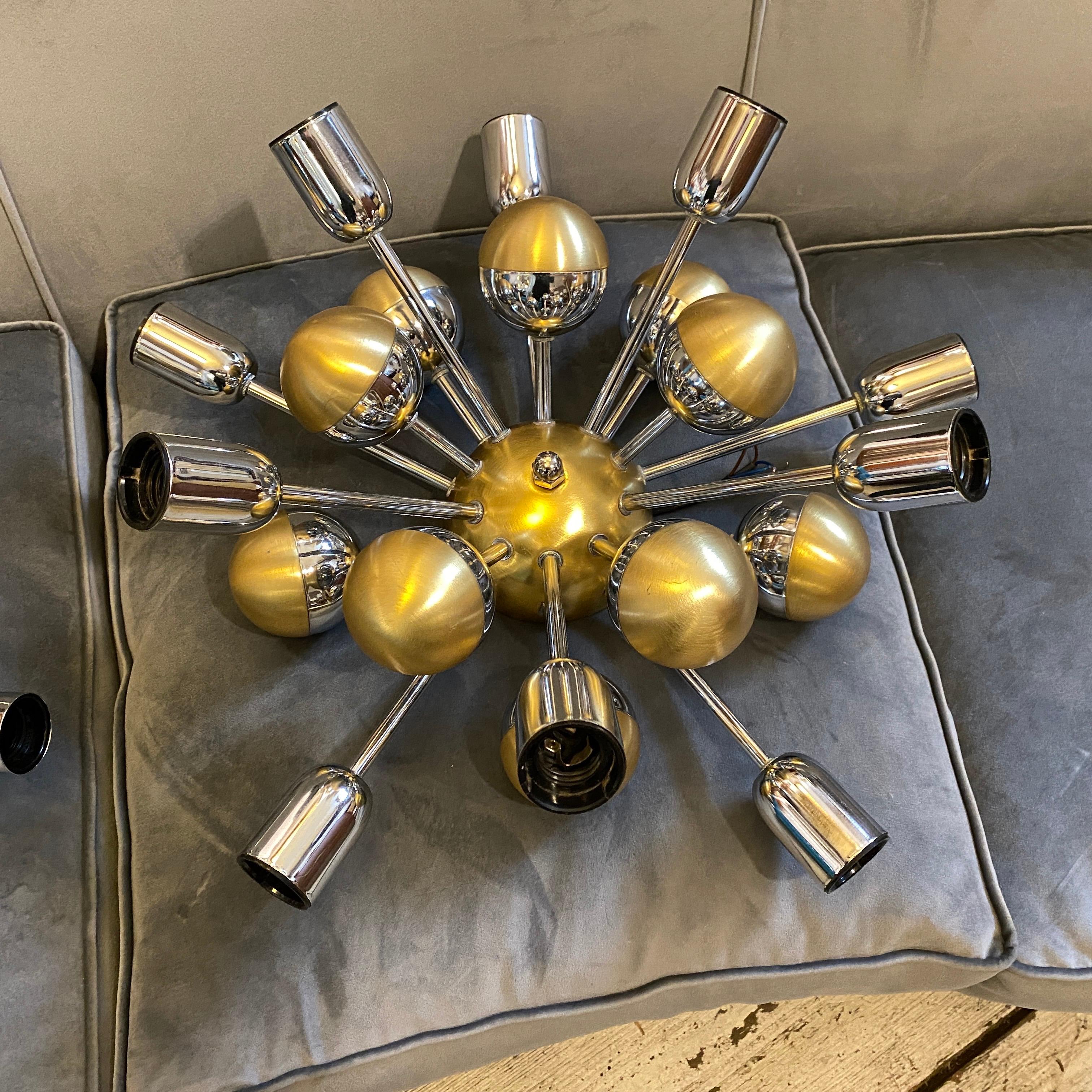Two amazing chromed metal and gilded aluminium wall sconces also usable as ceiling lights, they work 110-240 volts and need 10 regular e14 bulbs, electrical parts are recently rewired.