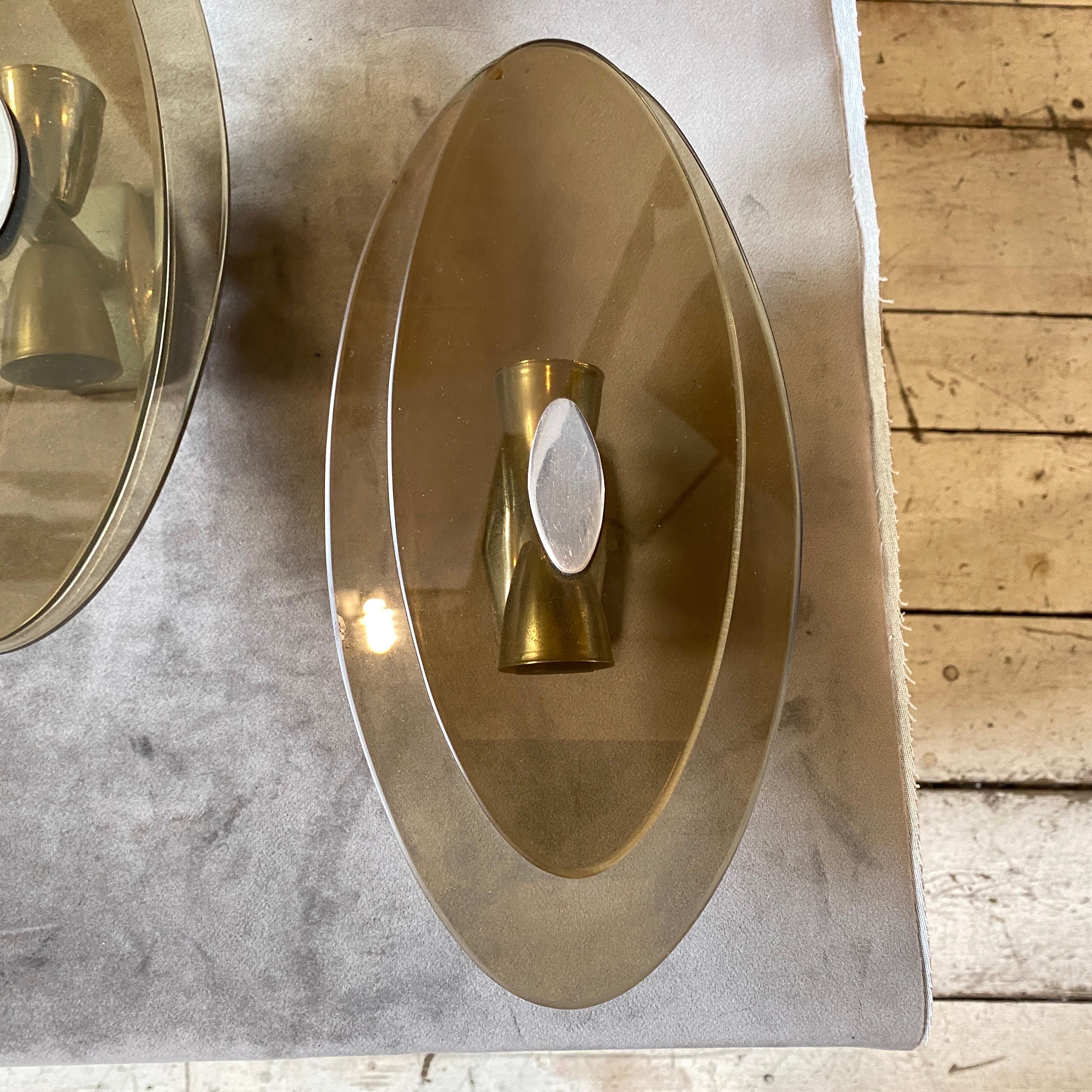 Two 1970s Space Age Metal and Smoked Glass Italian Oval Wall Sconces by Veca For Sale 2