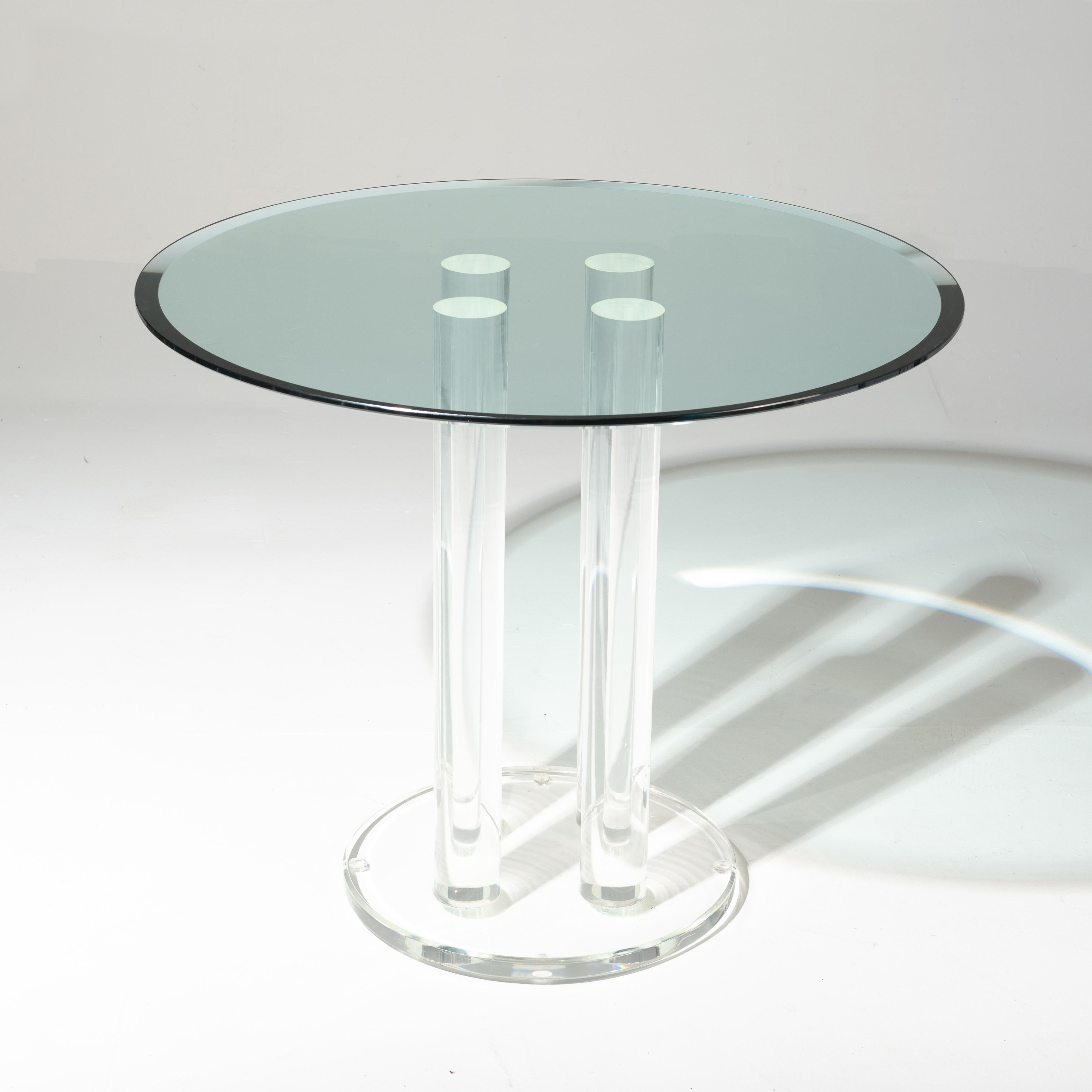 A Lucite dining. Table or center table from the 1970s. The base diameter is 18