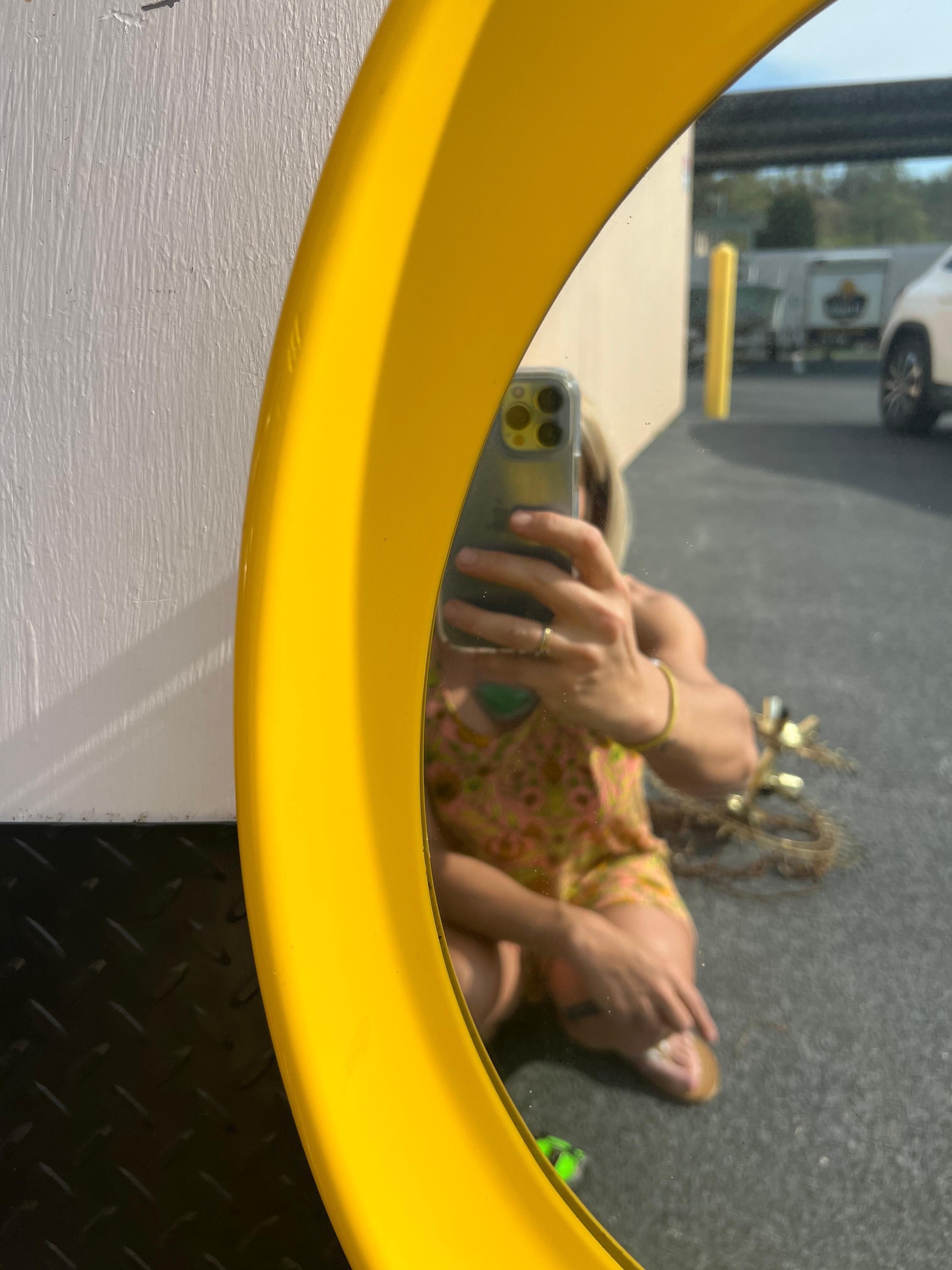 Oooh lawd I am loving this mirror!   There is nothing like a good pop of yellow to brighten a room!   This 1970’s plastic mirror has all the right curves in all the right places.  It is currently set up to hang vertically but can but hung horizontal