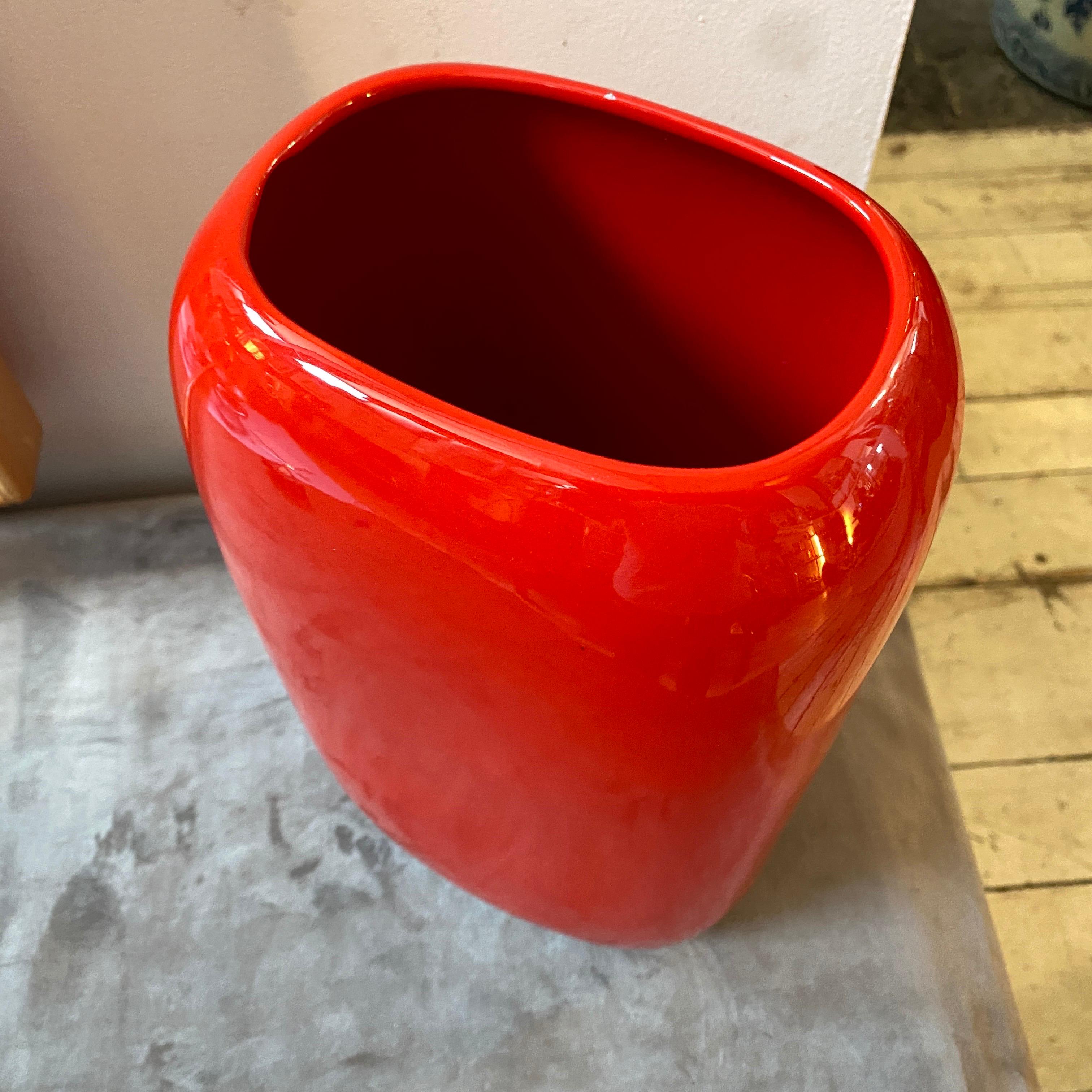A red ceramic vase made in Italy in the Seventies by Vittorio Fulgenzi, in that period it was very popular this kind of ceramic called vetrochina. It's labeled on a side Vittorio Fulgenzi.