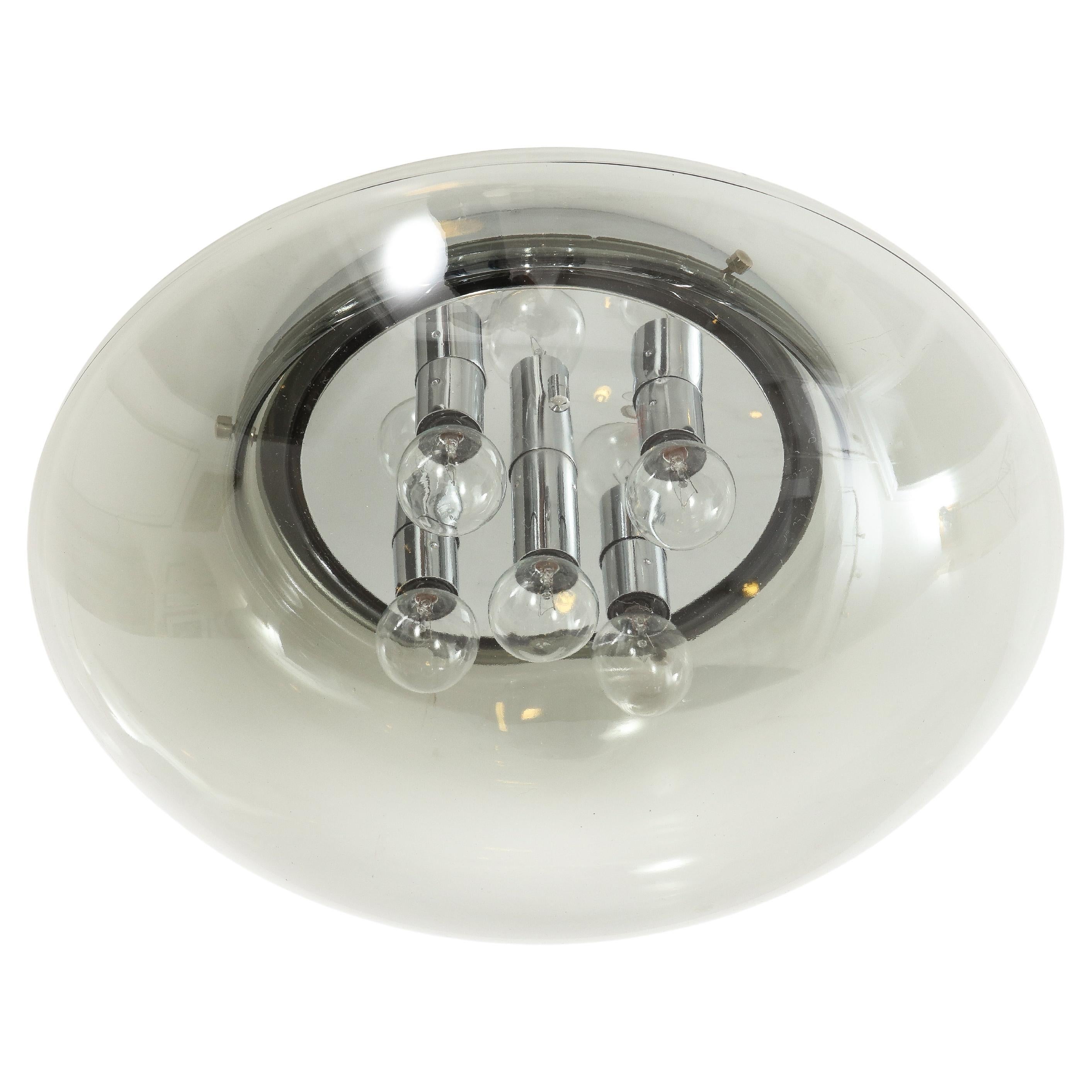 1970's Space Age smoked glass flush mount that can also be used
as a wall sconce.
The fixture has been Newly rewired and has 5 candelabra light sources.