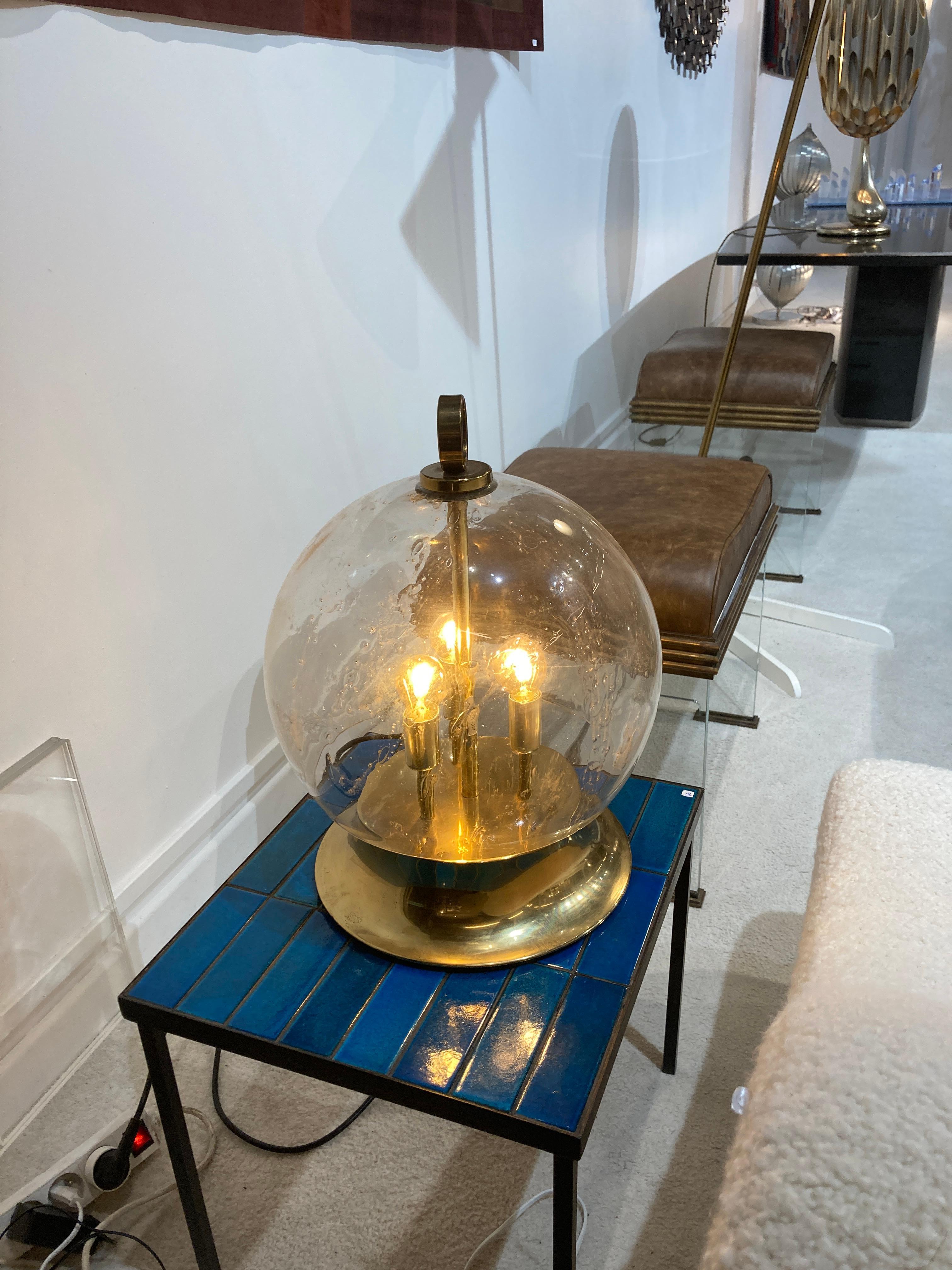 1970's Brass and bubbled glass lamp
Great condition
France