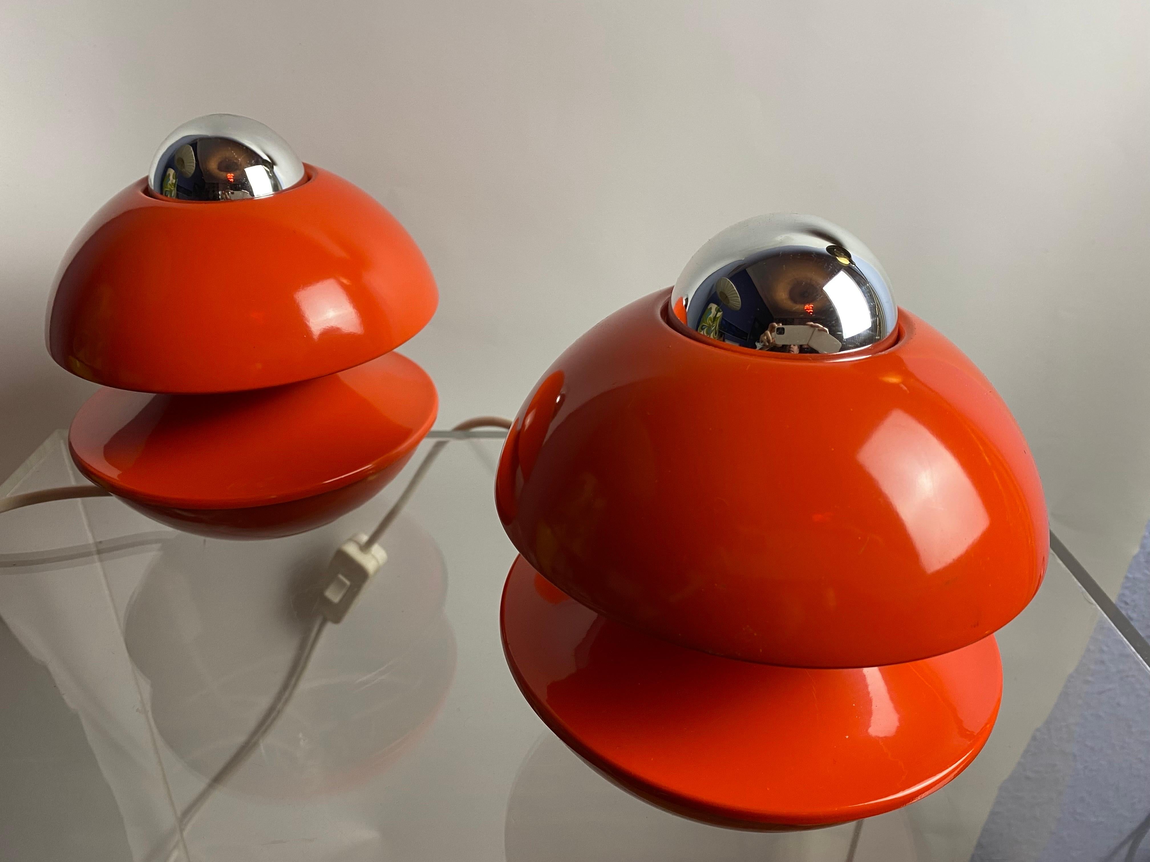 A pair of  really rare and elegant Space Age midcentury 1970s  modernist Wall lamps  Appliques or Tablelamps made in West-Germany by Kaiser-Leuchten , 
Designer : Klaus Hempel.
IF product Design Award 1972.
This Design is a good example for