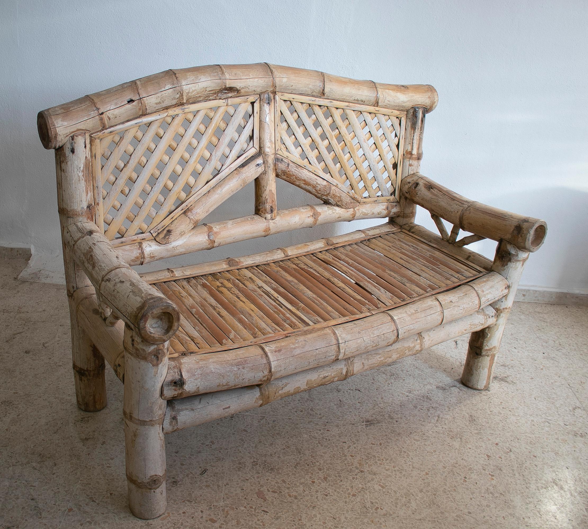 1970s Spanish 2-seater bamboo garden bench.